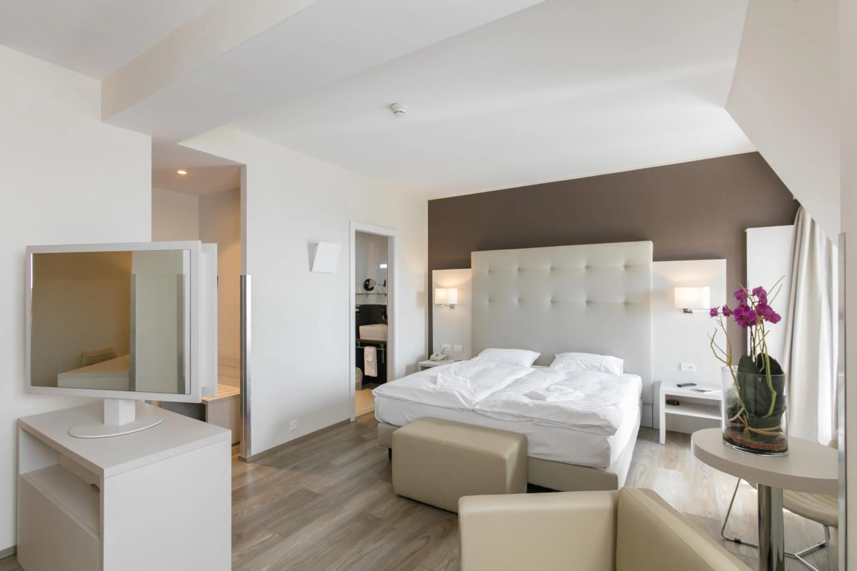 Bed in Hôtel Prealpina