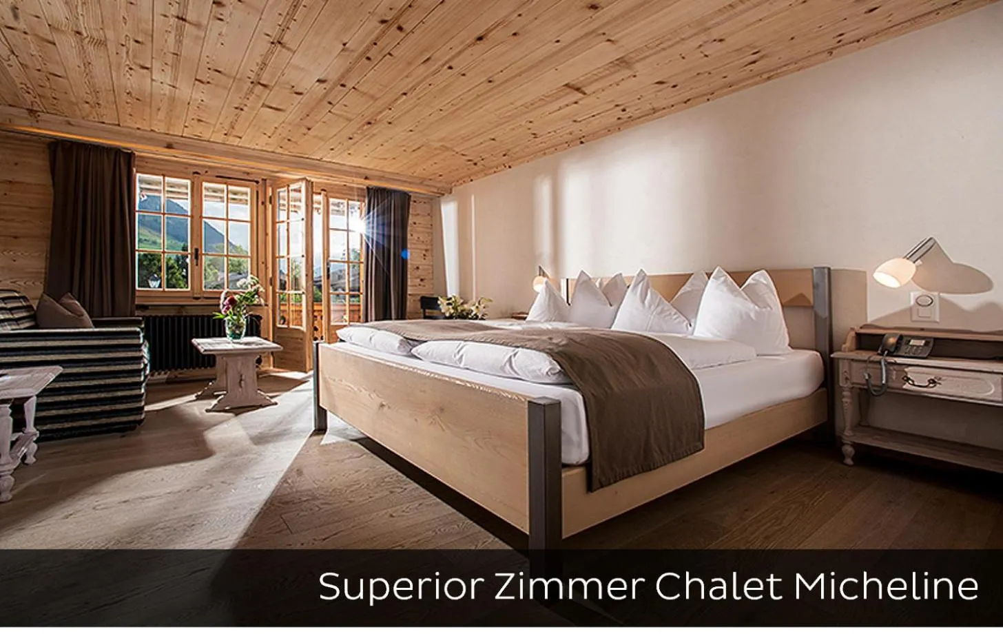 Photo of the whole room, Bed in Hotel Arc-en-ciel Gstaad