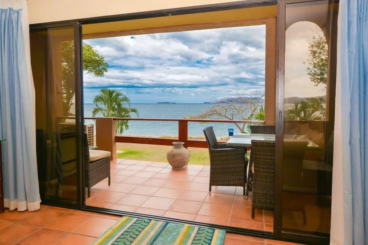Elegant 3BR Beachfront Condo with Spacious Interior, Ocean-View Terrace & Direct Access to Playa Flamingo