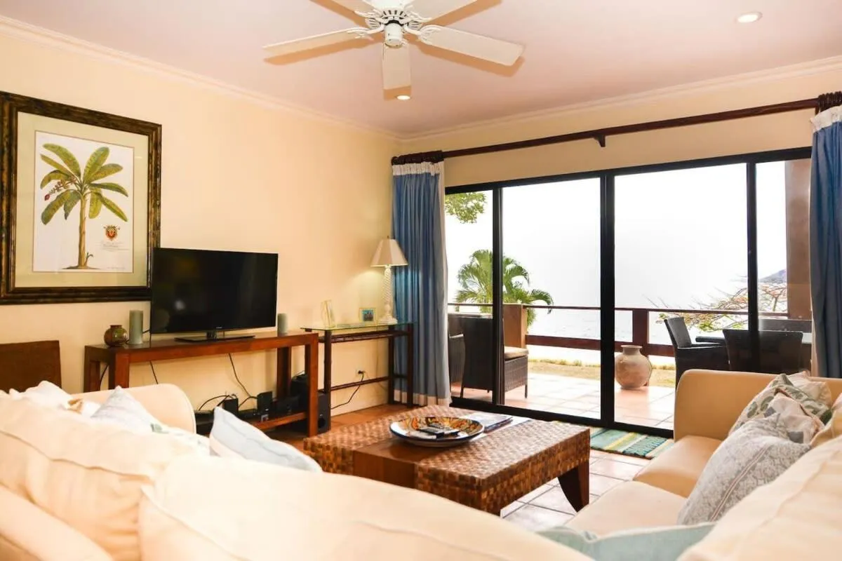 Elegant 3BR Beachfront Condo with Spacious Interior, Ocean-View Terrace & Direct Access to Playa Flamingo