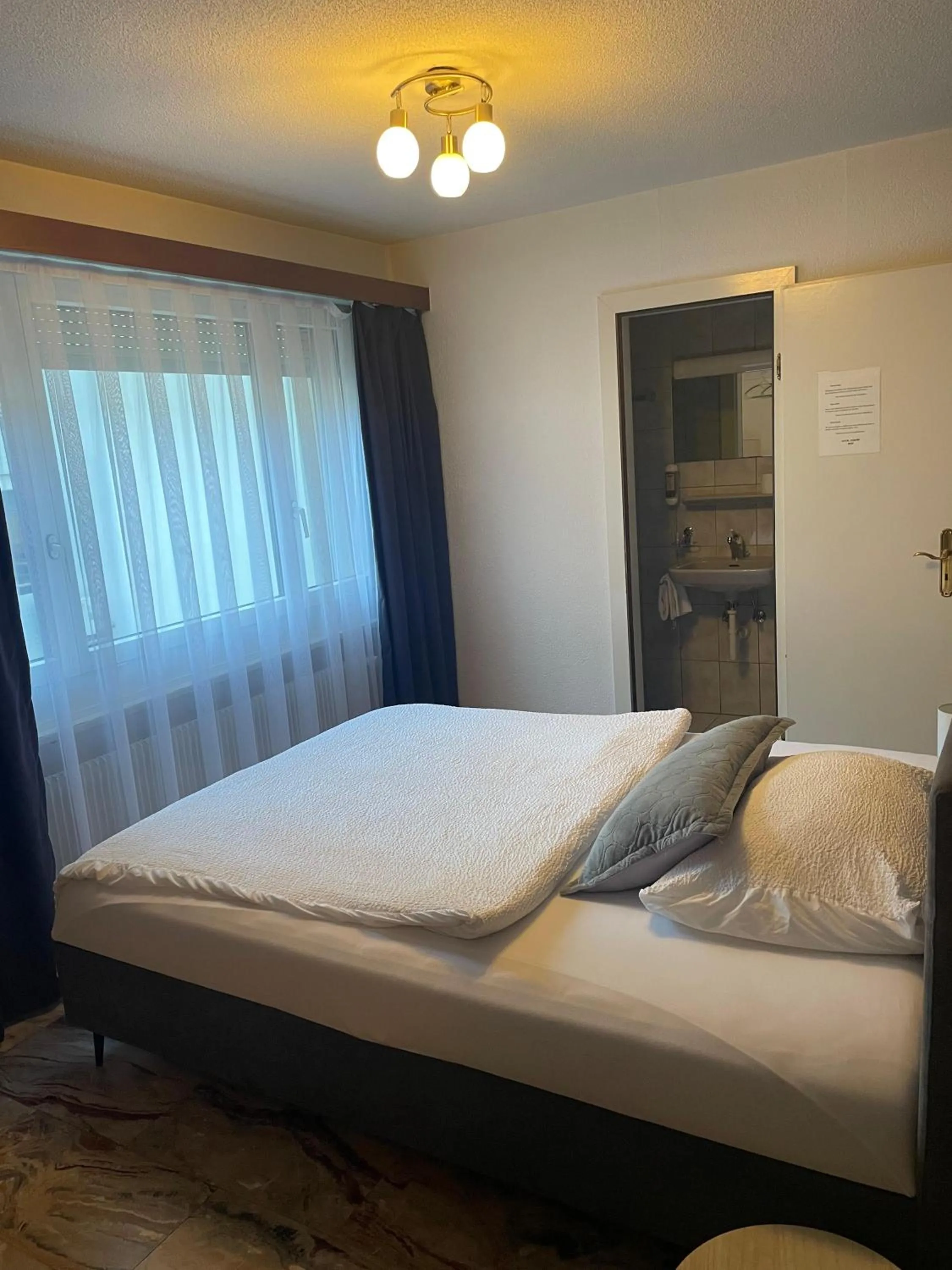 Bed in Hotel Europe Brig