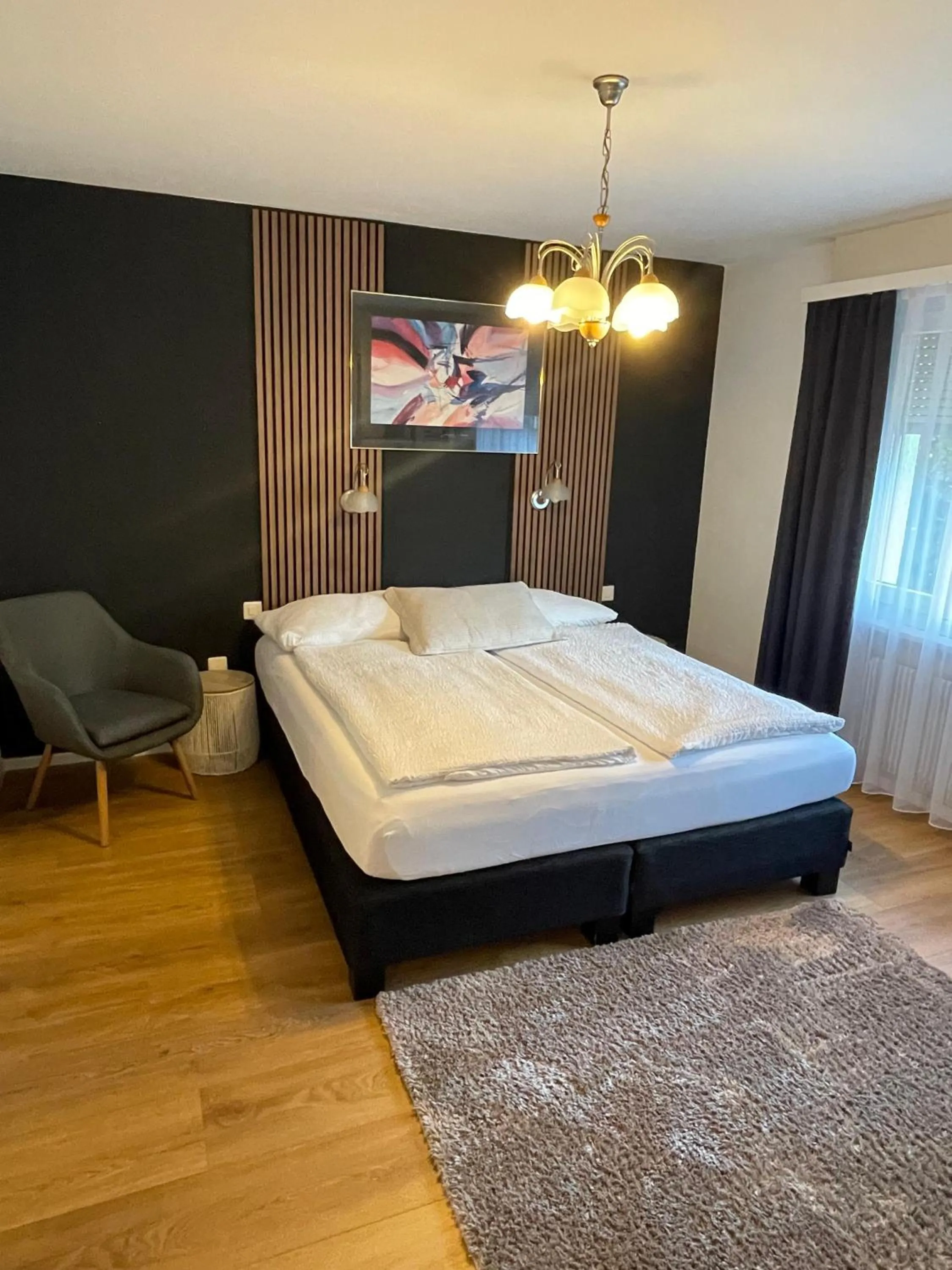 Bed in Hotel Europe Brig