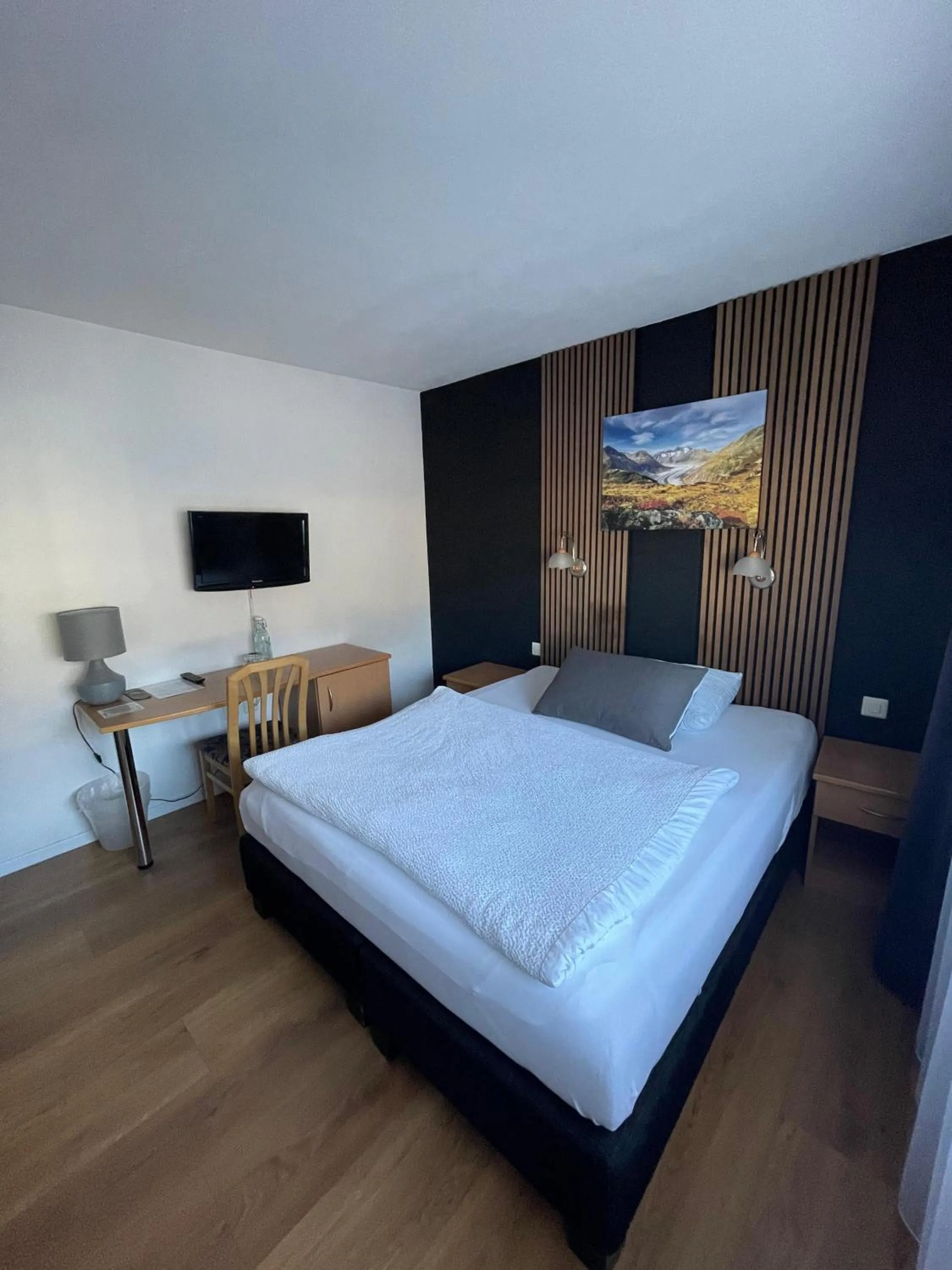 Bed in Hotel Europe Brig