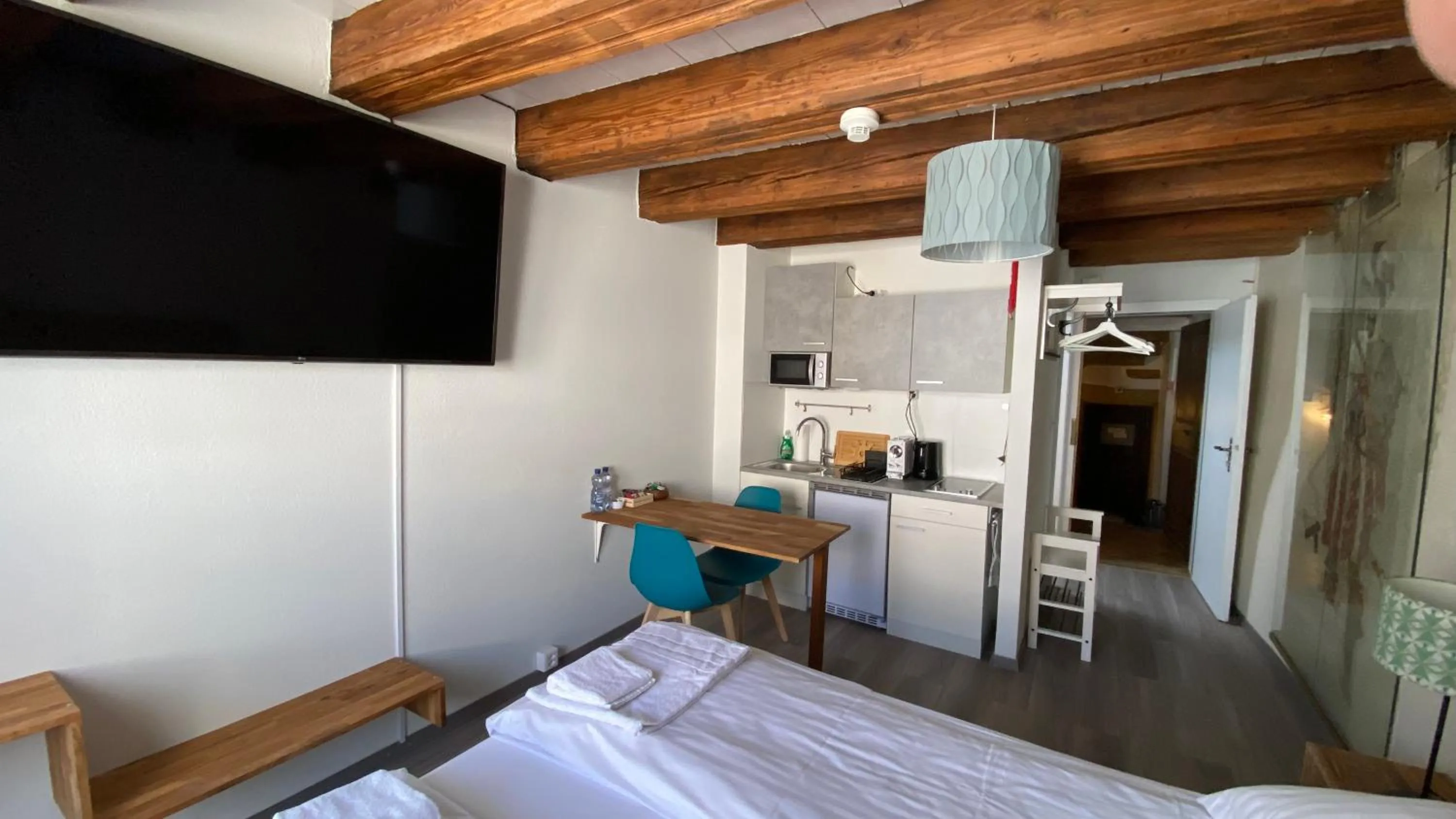 Bed in Aux chambres du Banneret