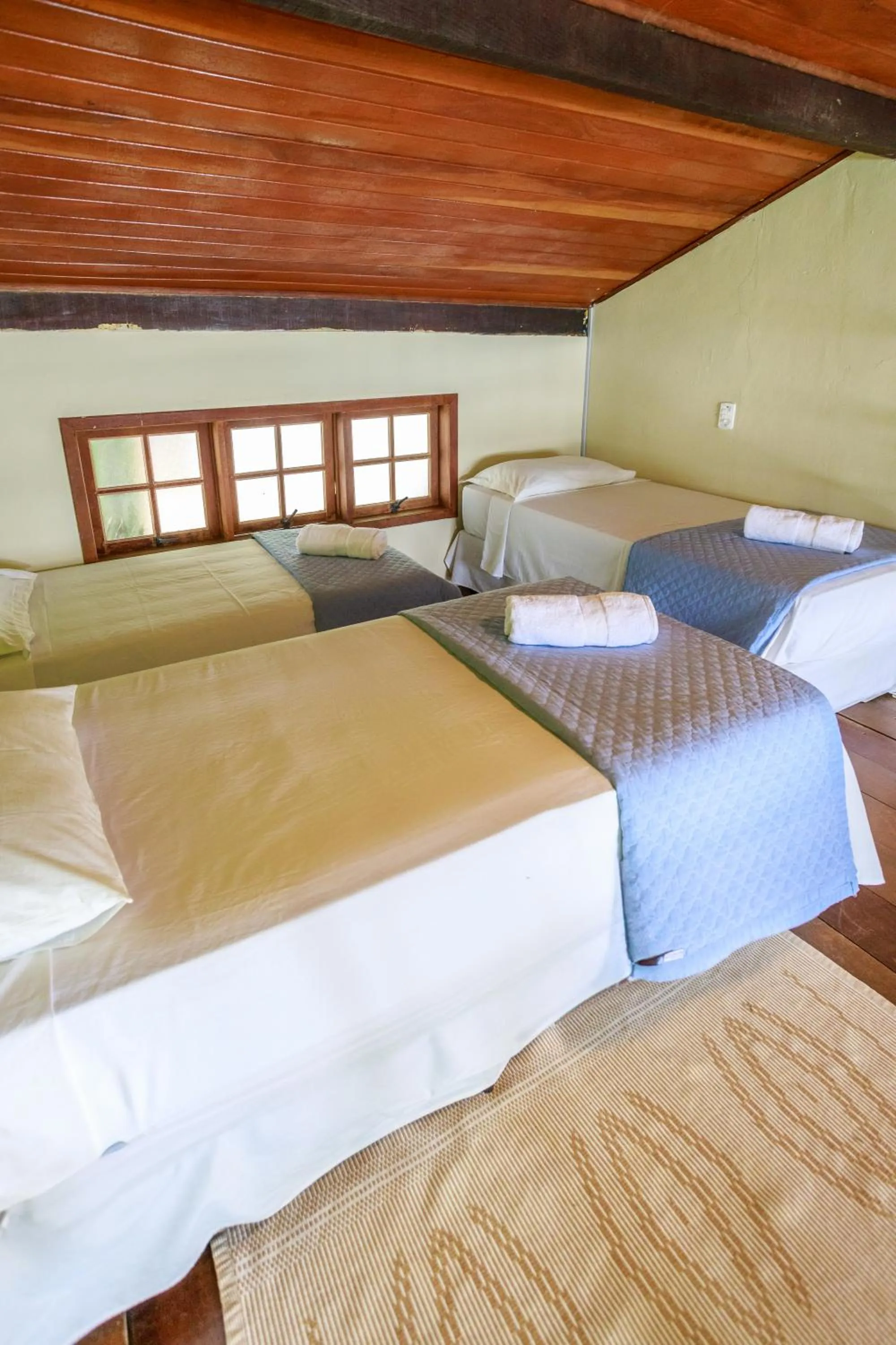 Bed in Pousada Cruzoé