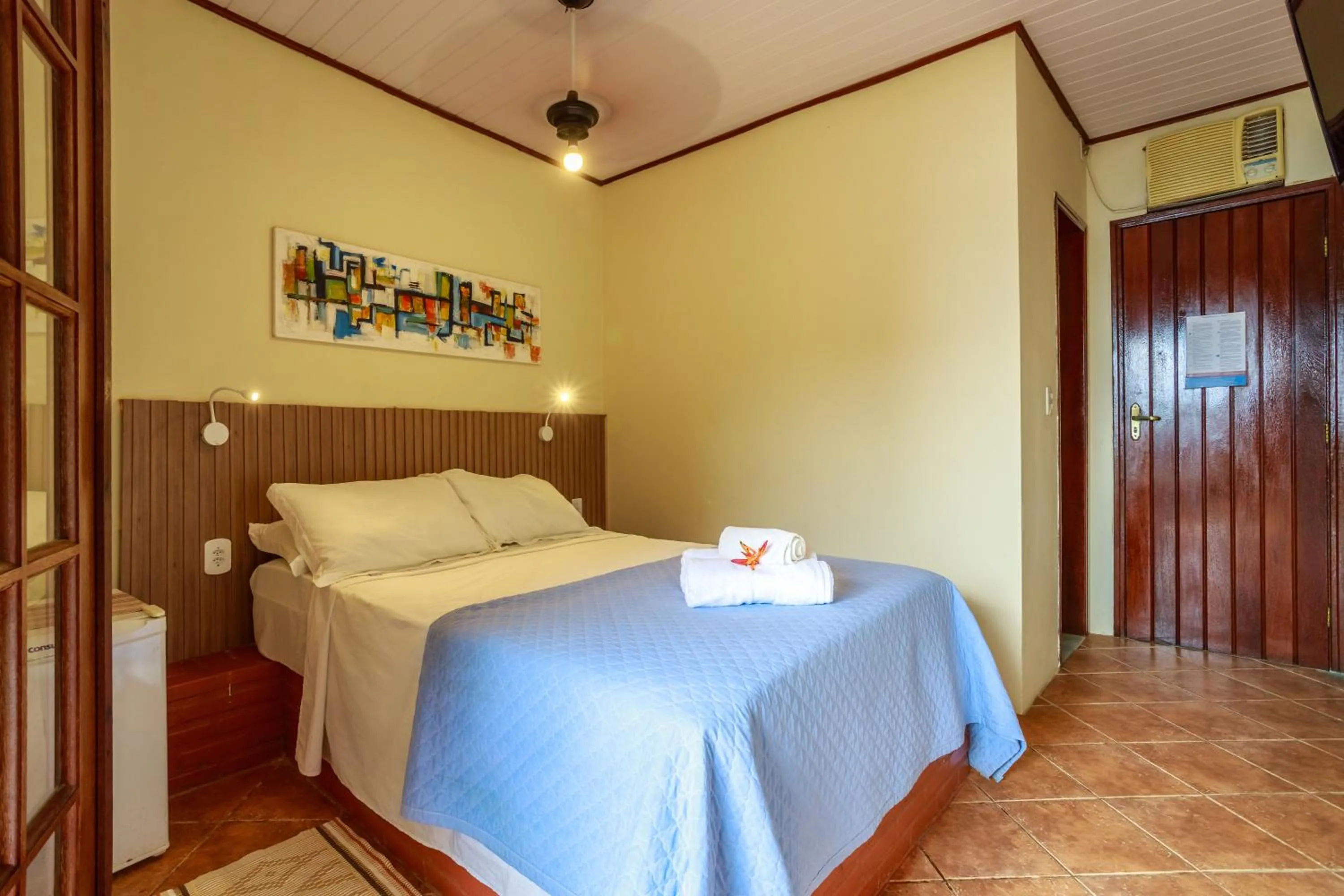 Bed in Pousada Cruzoé