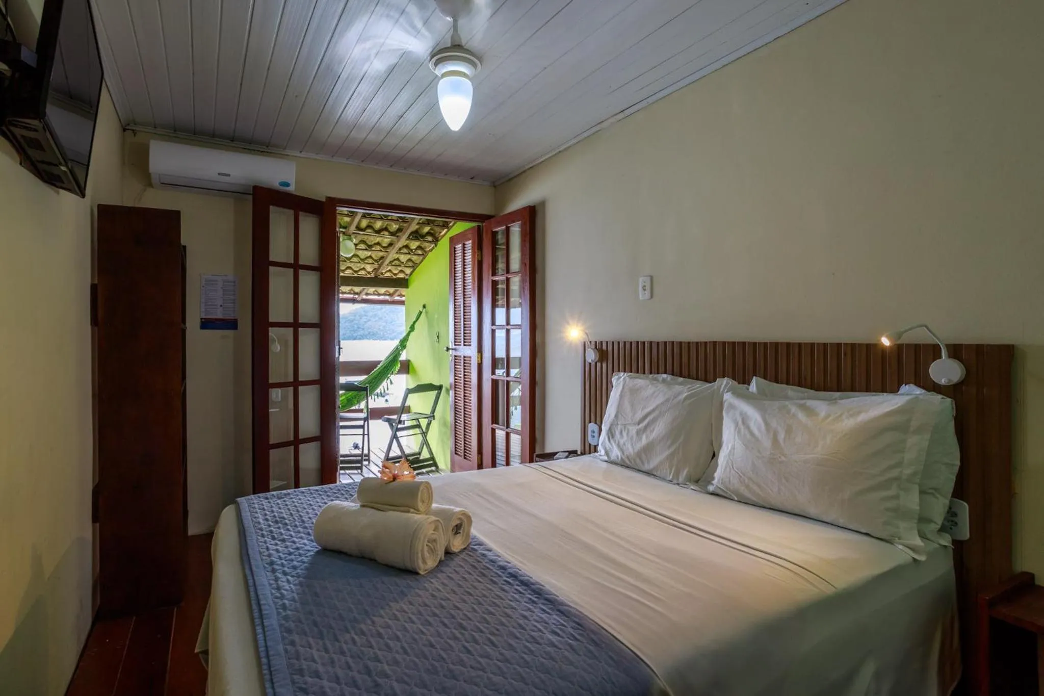 Bed in Pousada Cruzoé