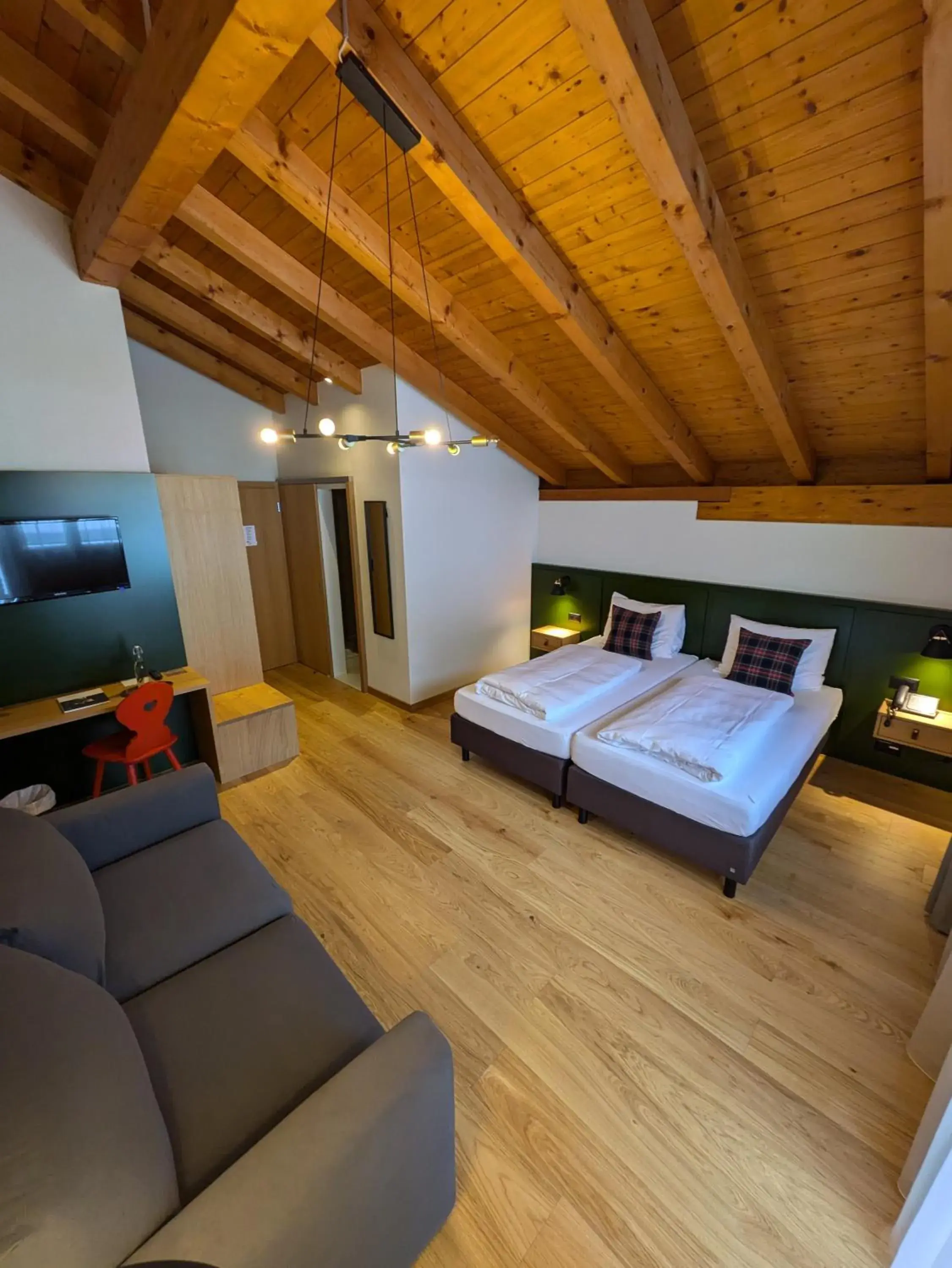 Deluxe Family Room with Balcony - single occupancy in Hotel Sonnwendhof Engelberg Deluxe Family Room with Balcony - single occupancy in Hotel Sonnwendhof Engelberg