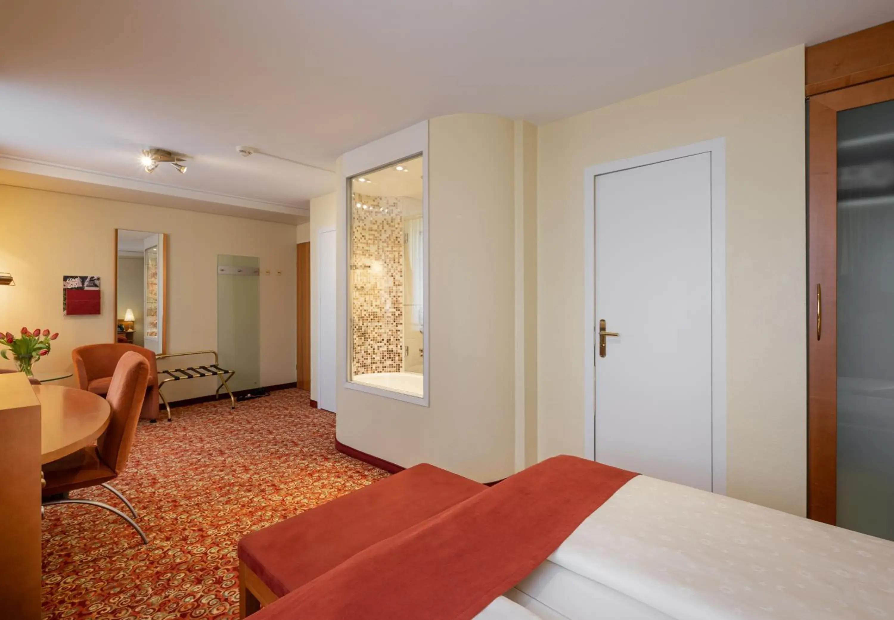 Living room, Bed in GAIA Hotel Basel - the sustainable 4 star hotel Living room, Bed in GAIA Hotel Basel - the sustainable 4 star hotel