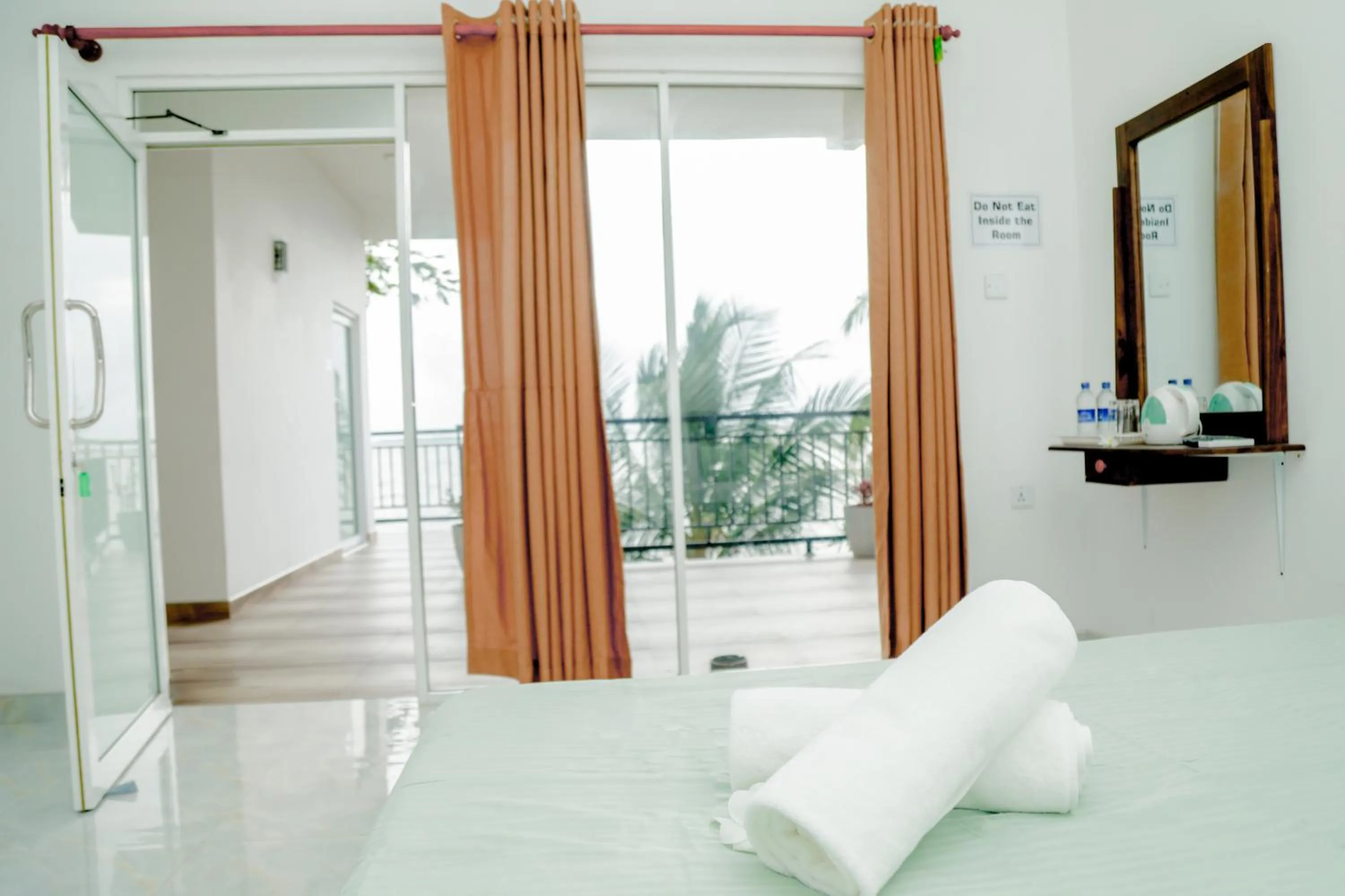 Bed in Araliya Lagoon Park Resort