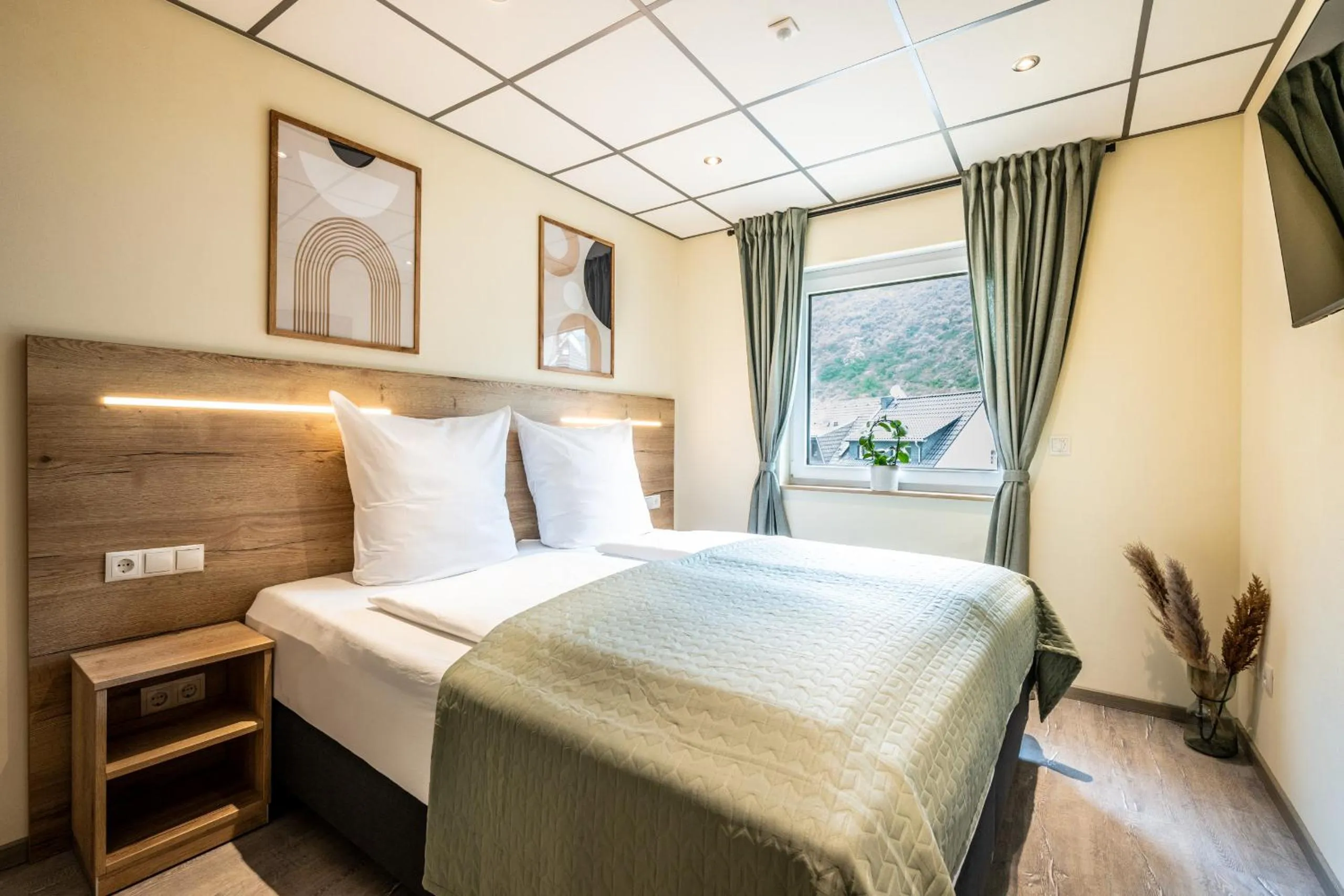 Bed in Apart Hotel Lang