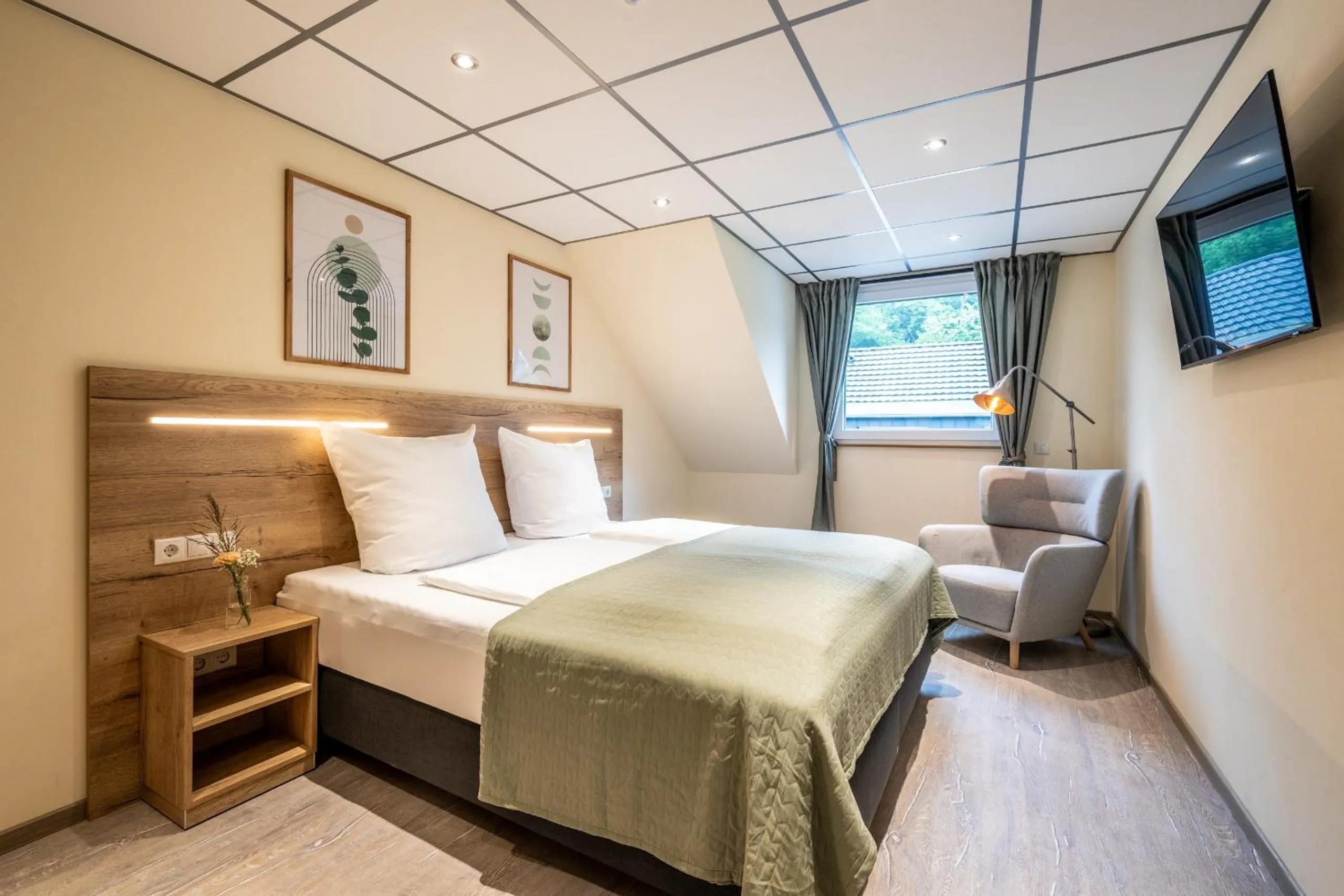 Bed in Apart Hotel Lang