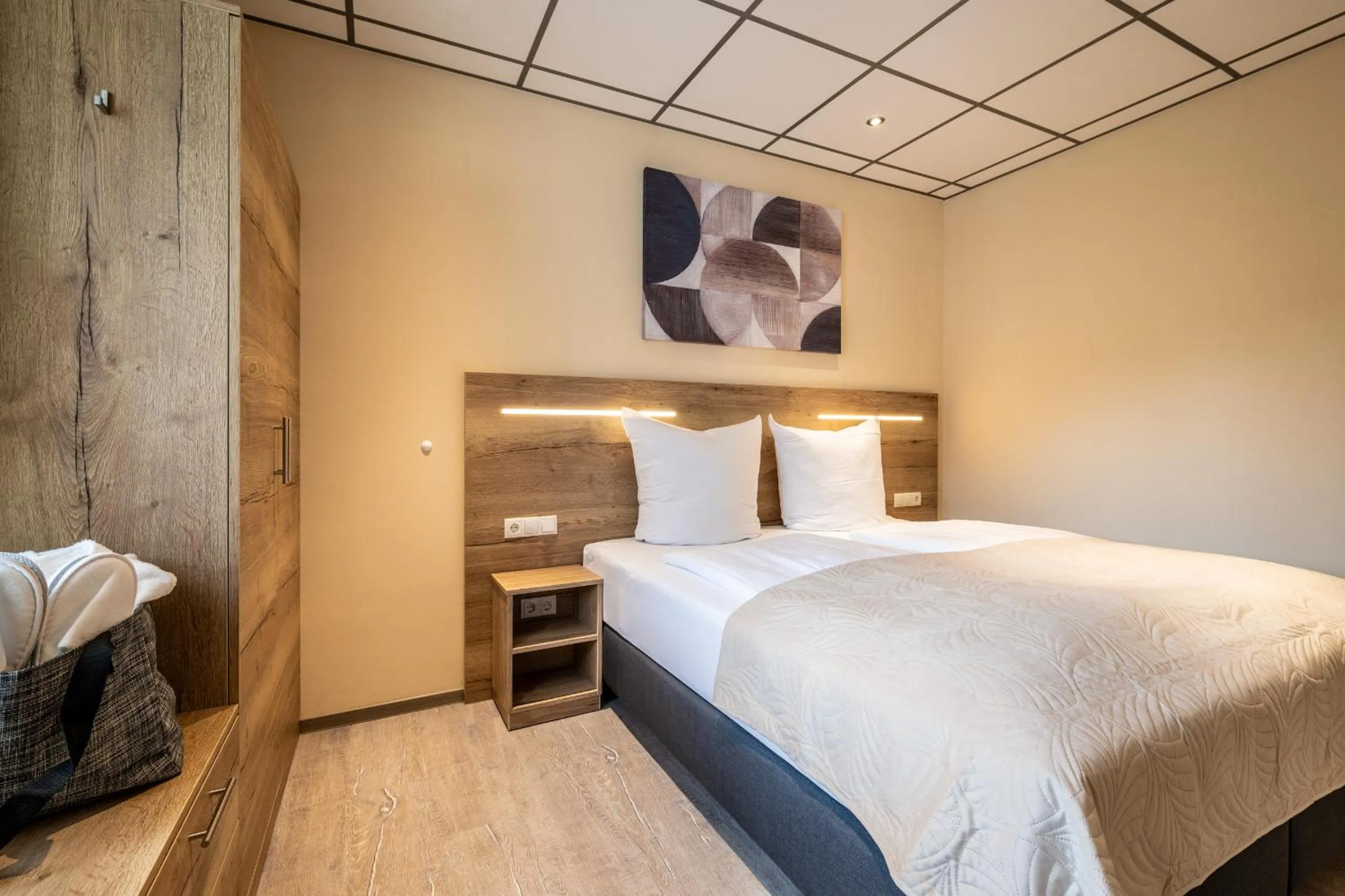 Bed in Apart Hotel Lang