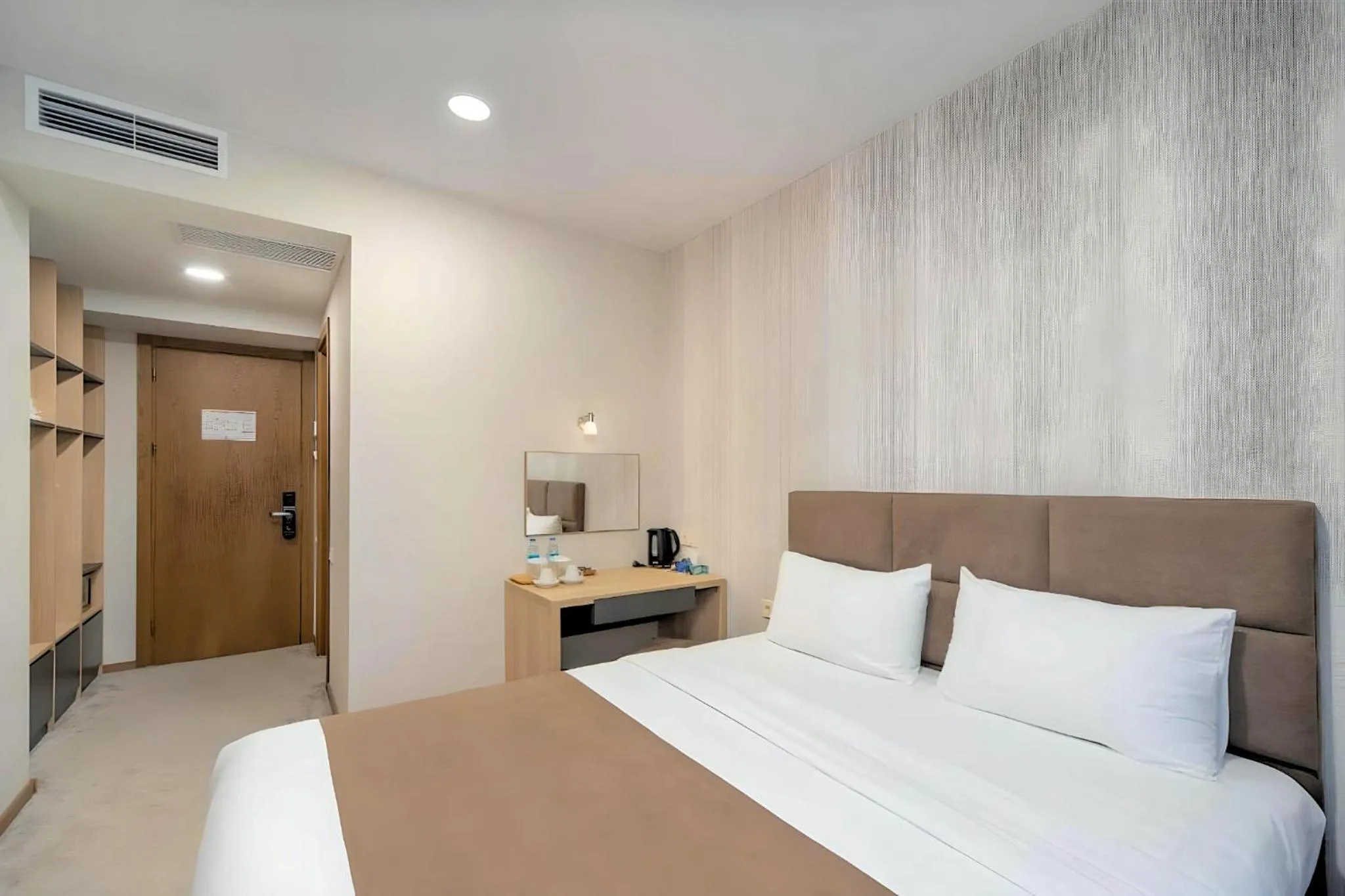 Bed in Brooch Boutique Hotel