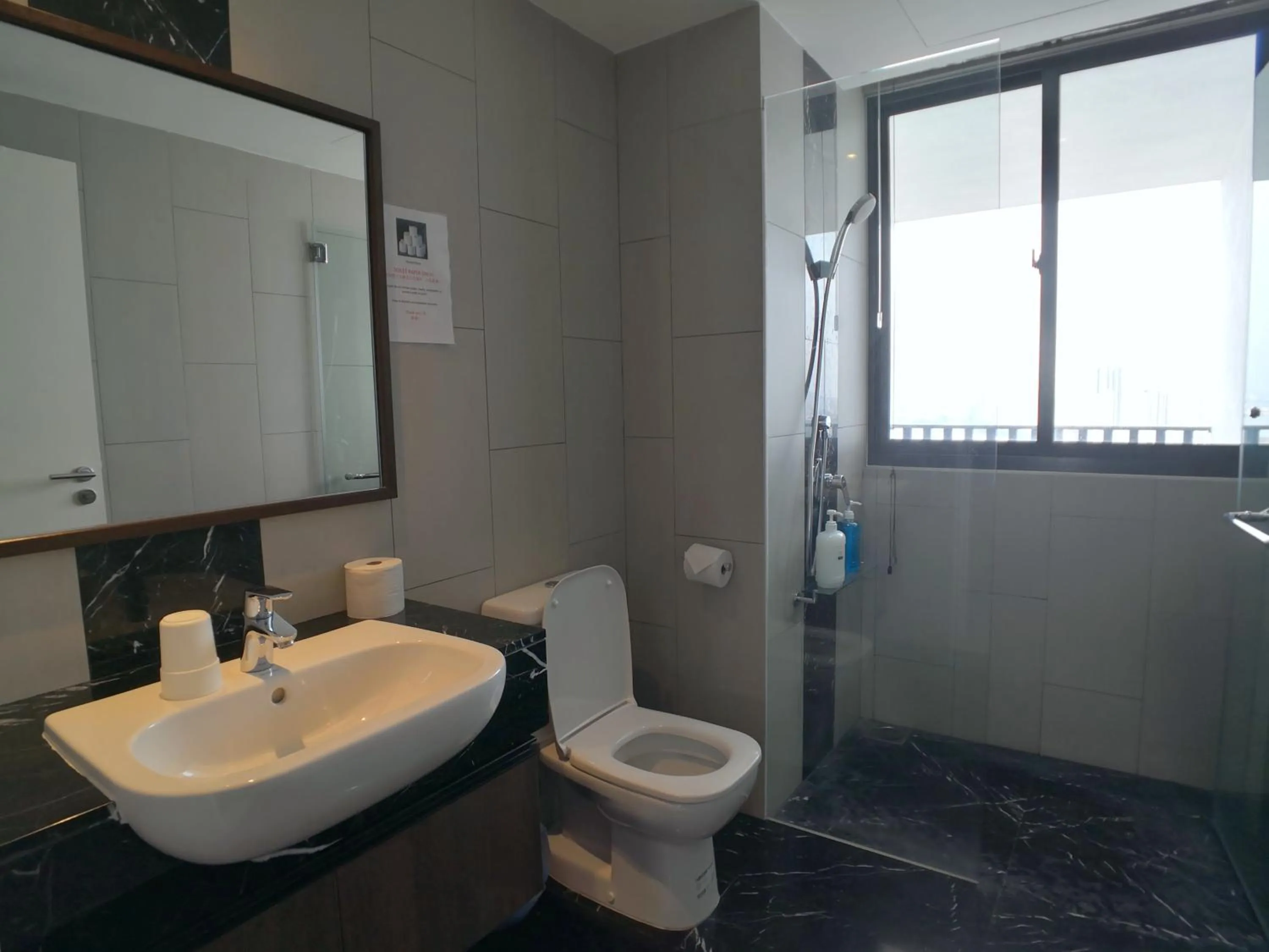 Bathroom in The Landmark by Comfy