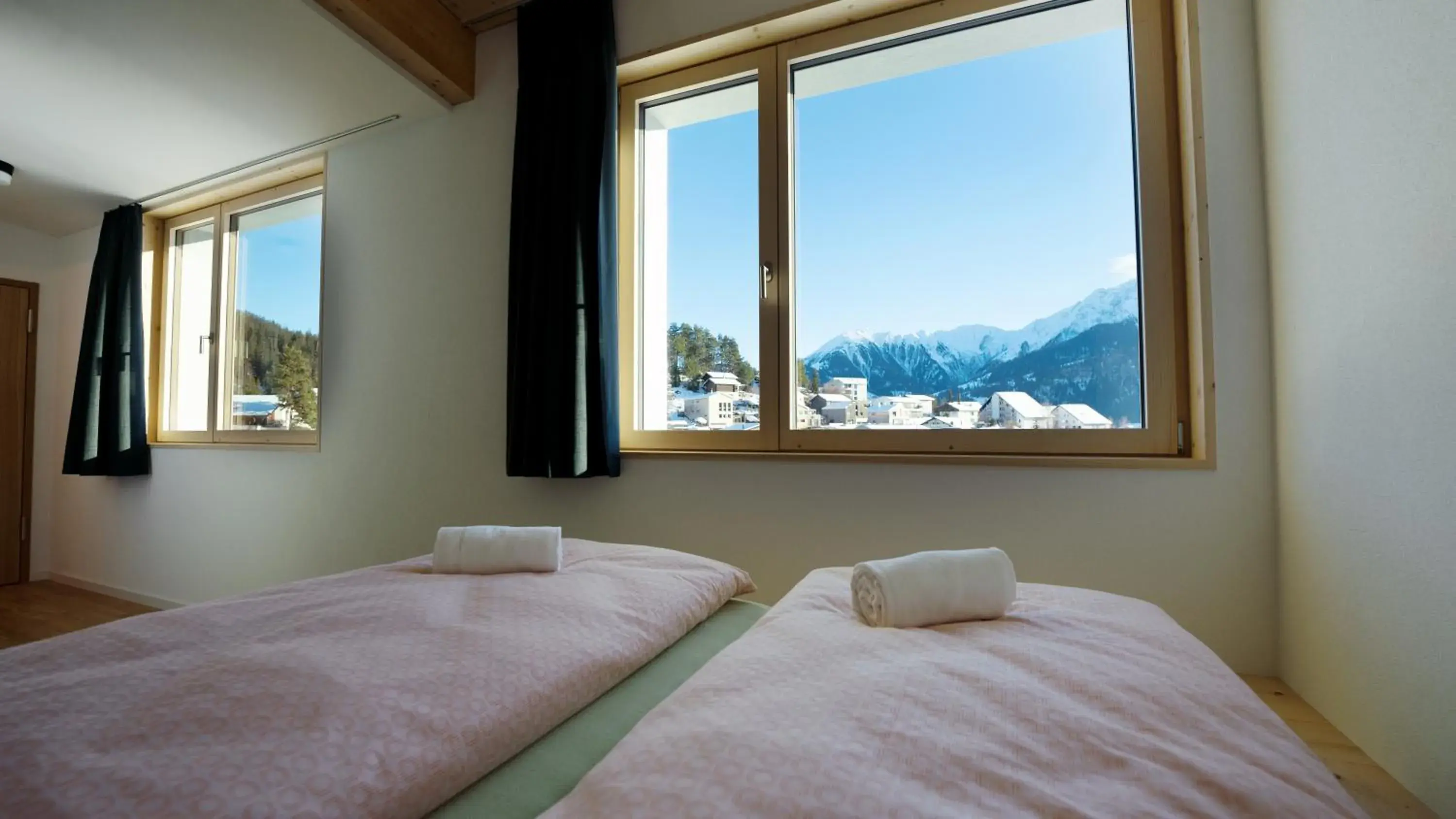 Double Room with Shower and Lake View - incl. Pool Access in Laax wellnessHostel3000 Double Room with Shower and Lake View - incl. Pool Access in Laax wellnessHostel3000
