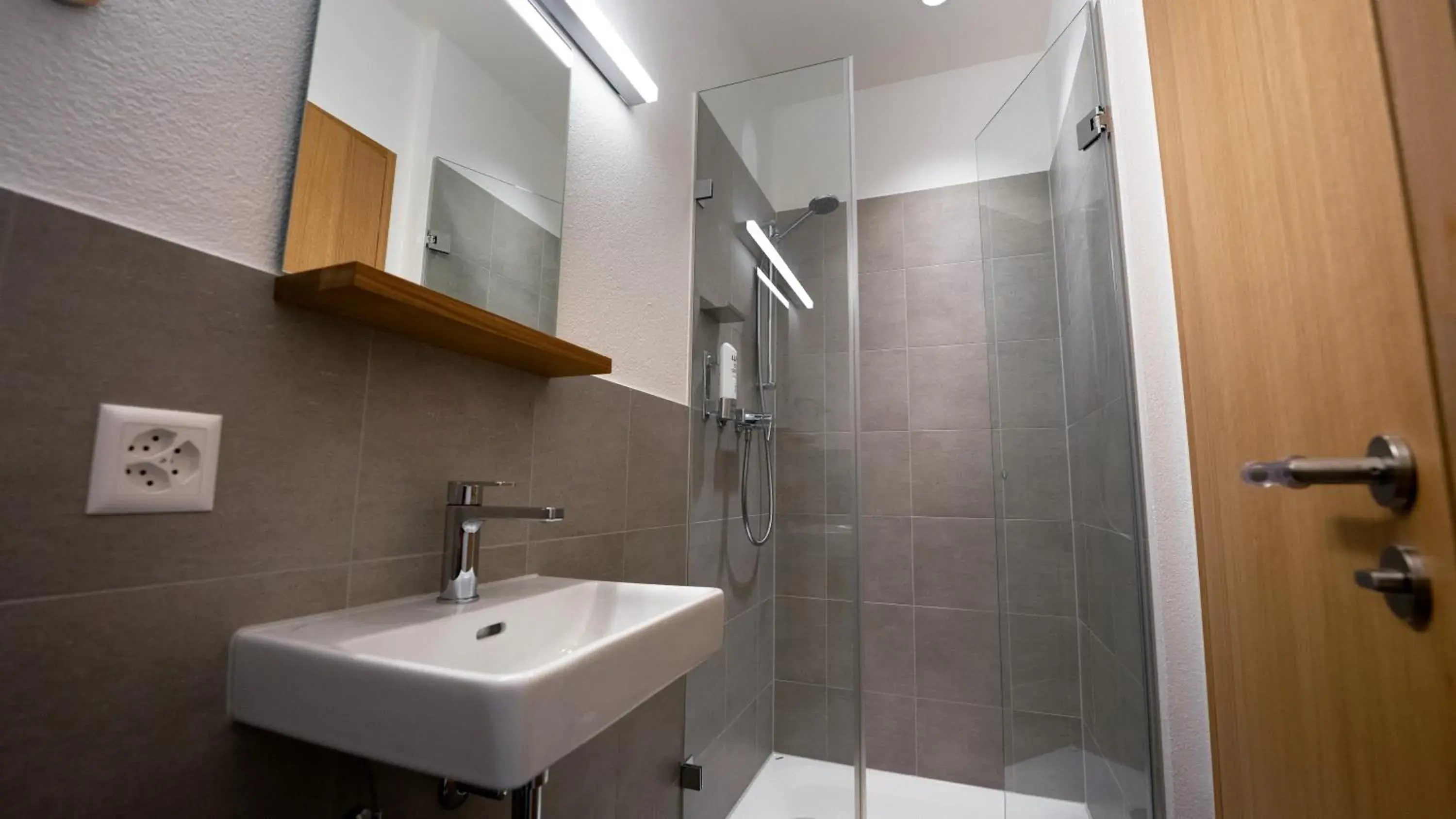 Family Room with Shower - incl. Pool Access in Laax wellnessHostel3000 Family Room with Shower - incl. Pool Access in Laax wellnessHostel3000