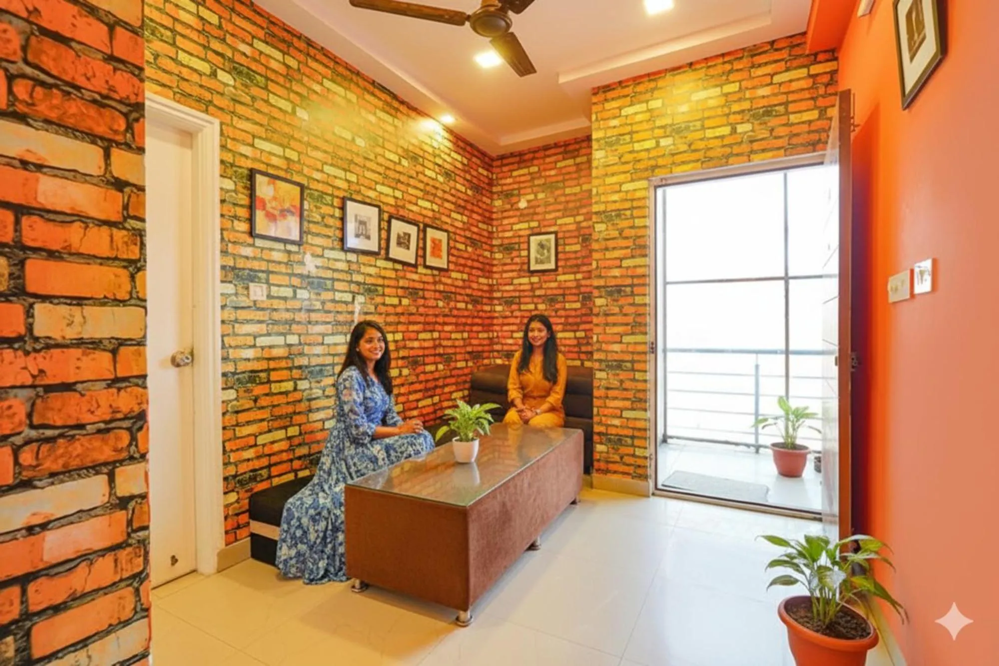 Seating area in FabHotel Kings Suites Banaswadi