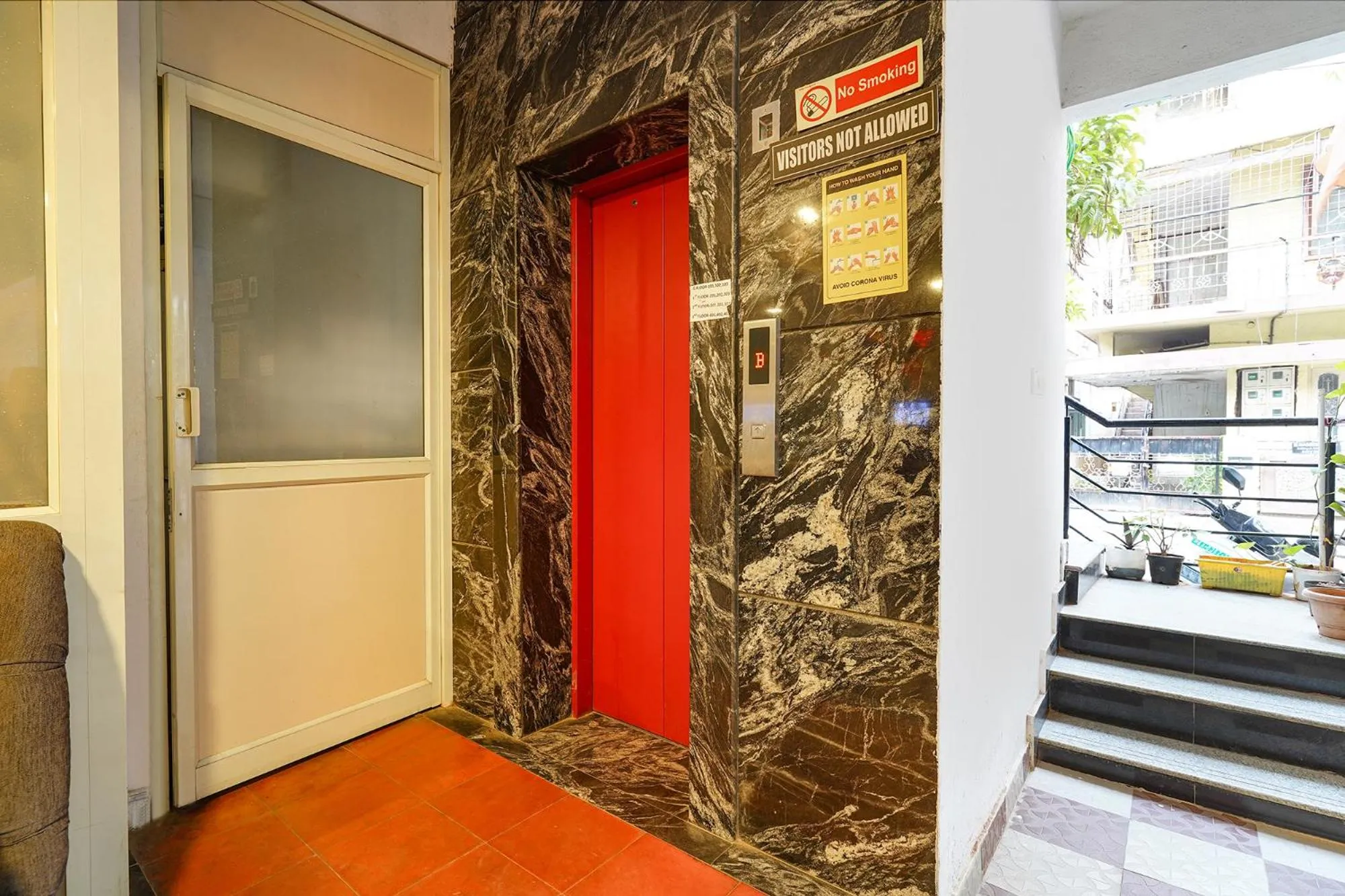 elevator in FabHotel Kings Suites Banaswadi