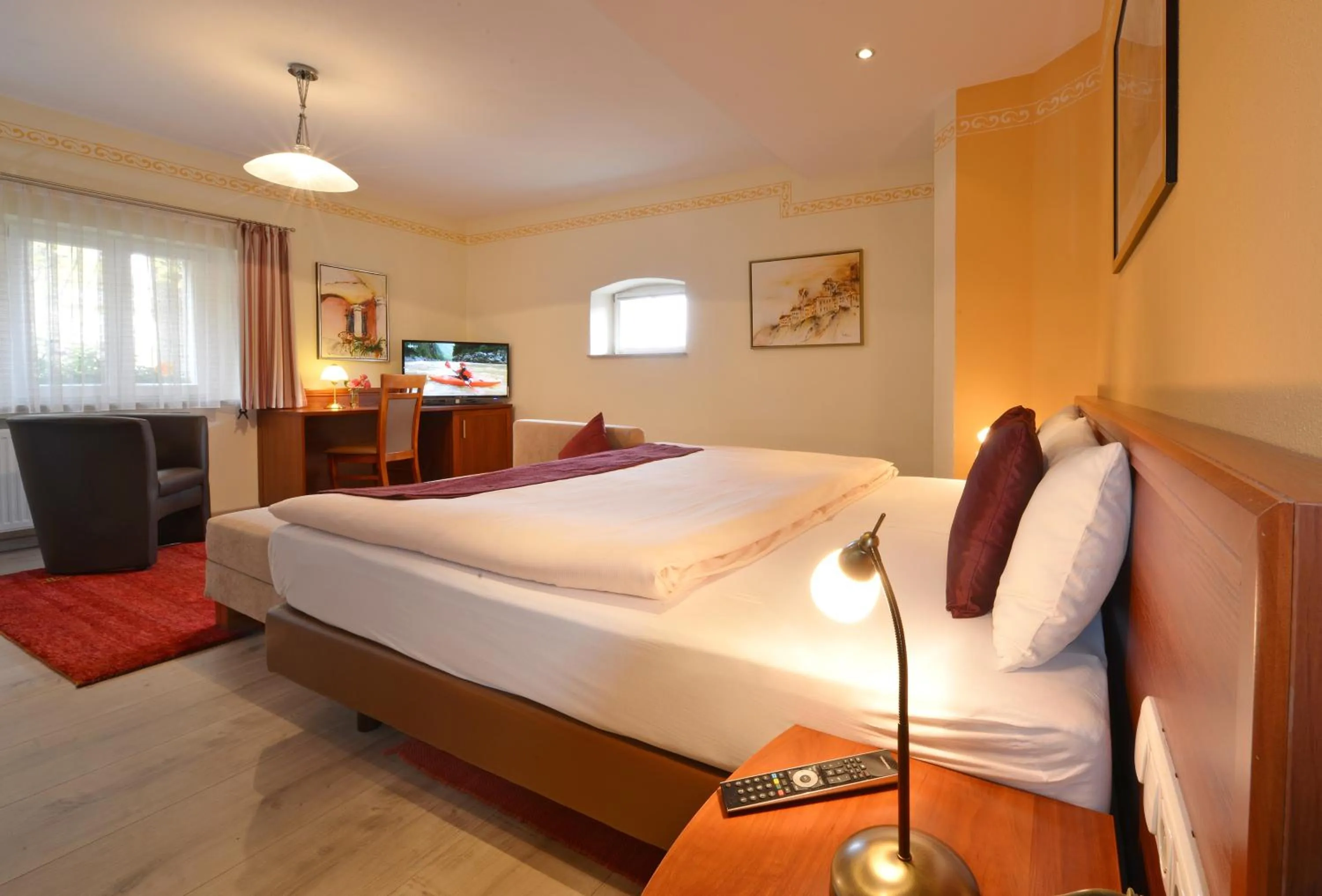 Photo of the whole room, Bed in Landhotel Schwarzes Ross