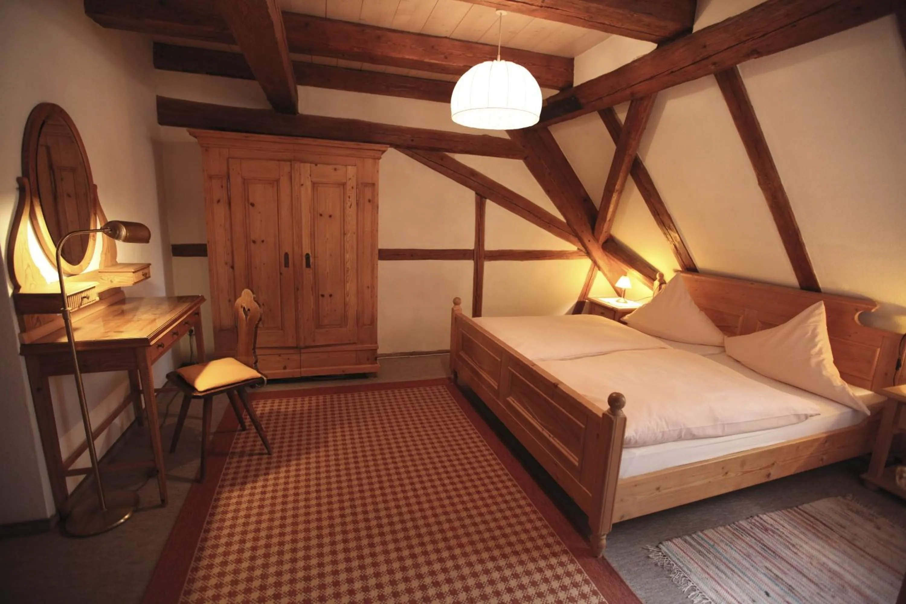 Photo of the whole room, Bed in Landhotel Schwarzes Ross