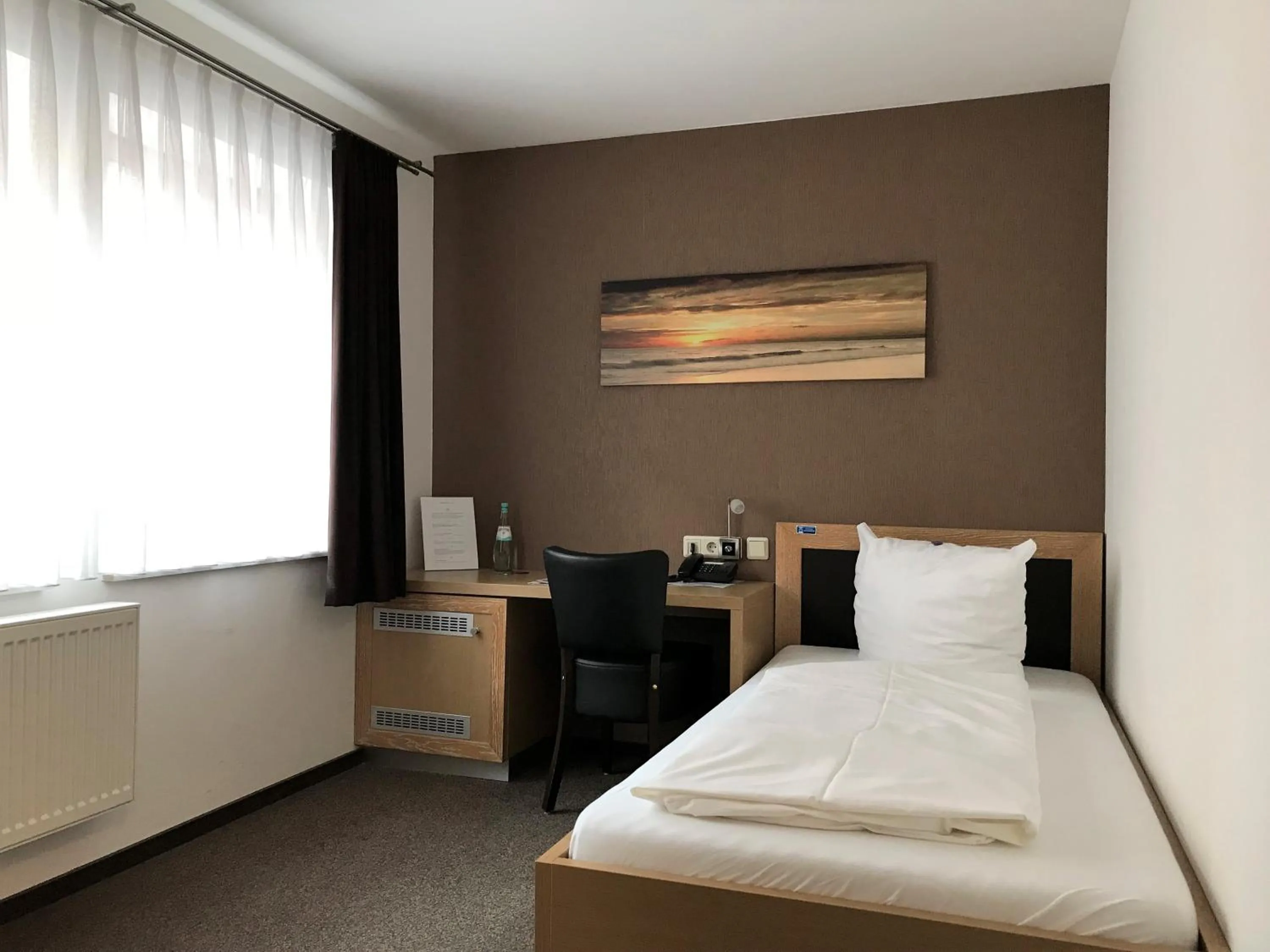 Bed in Hotel Mühlhäuser Hof