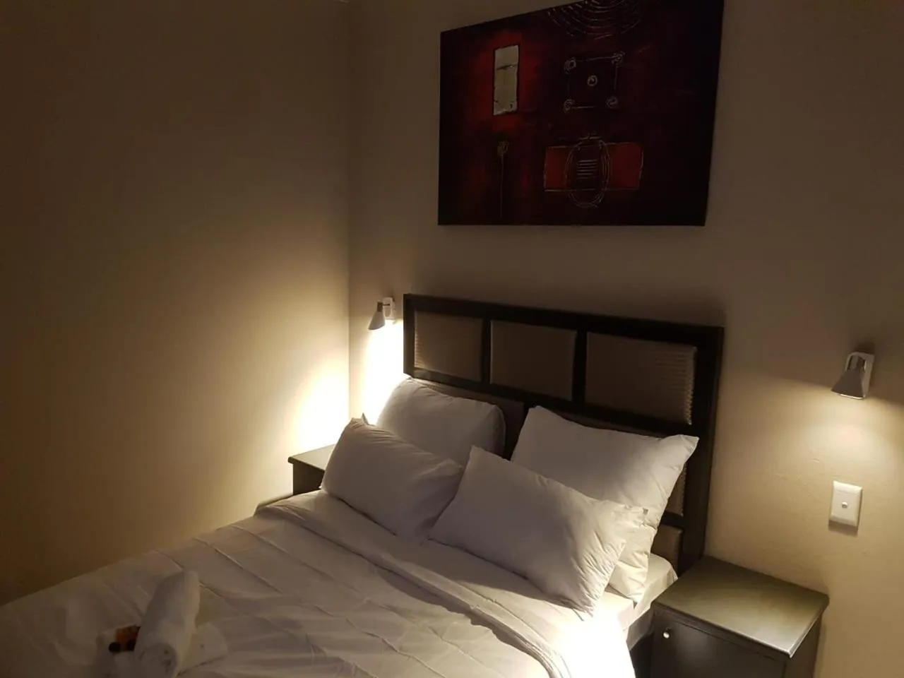 Bed in The Royal Prime Guest Lodge