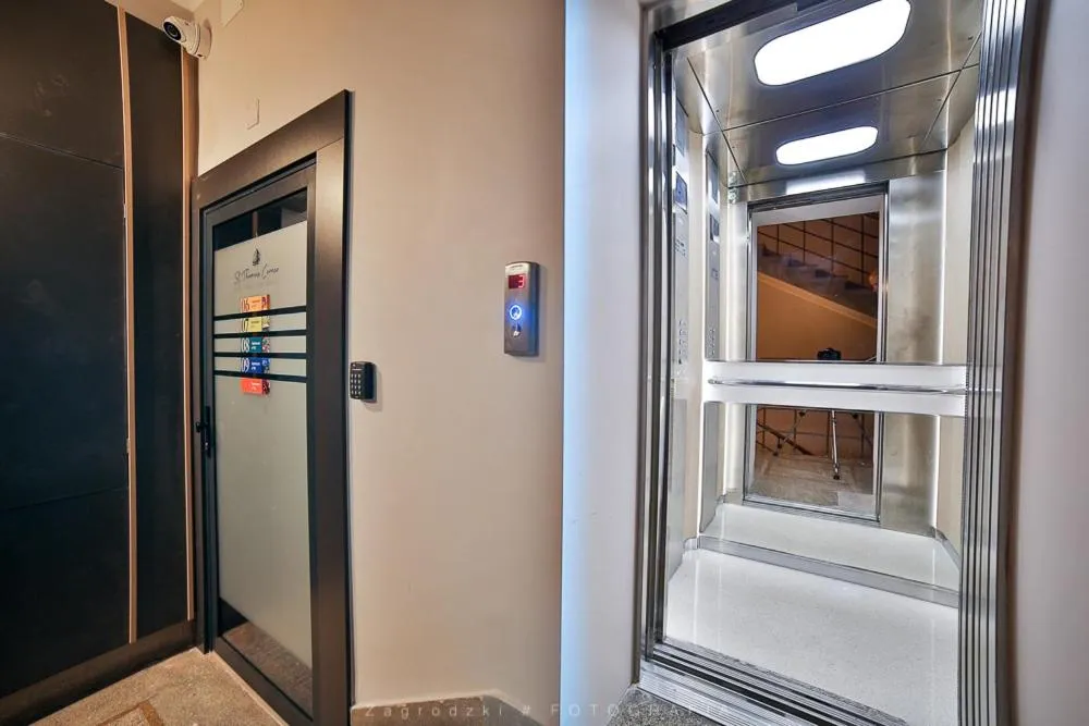 elevator in Saint Thomas Corner - by Upstairs