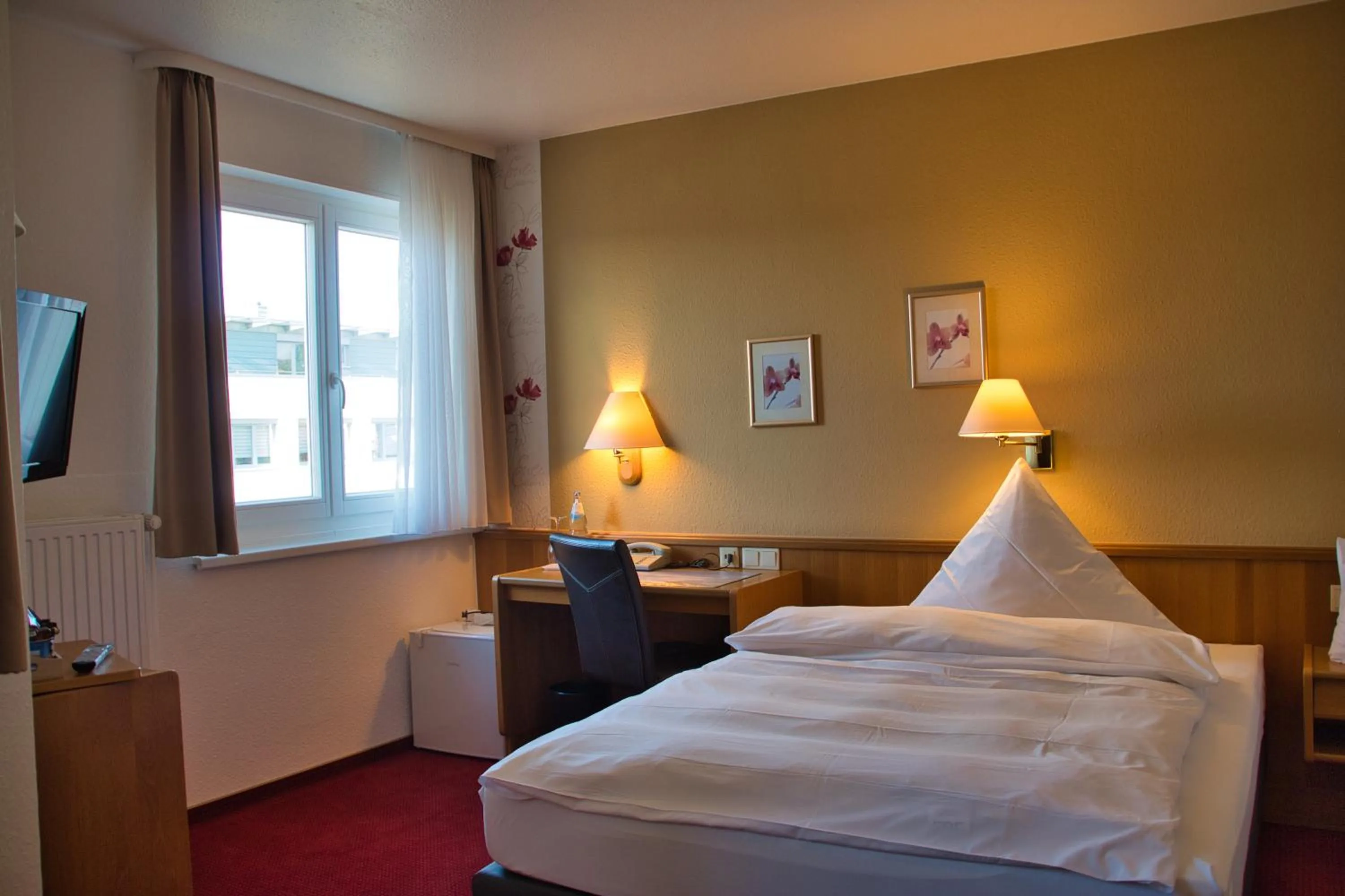 Bed in Hotel Quellenhof