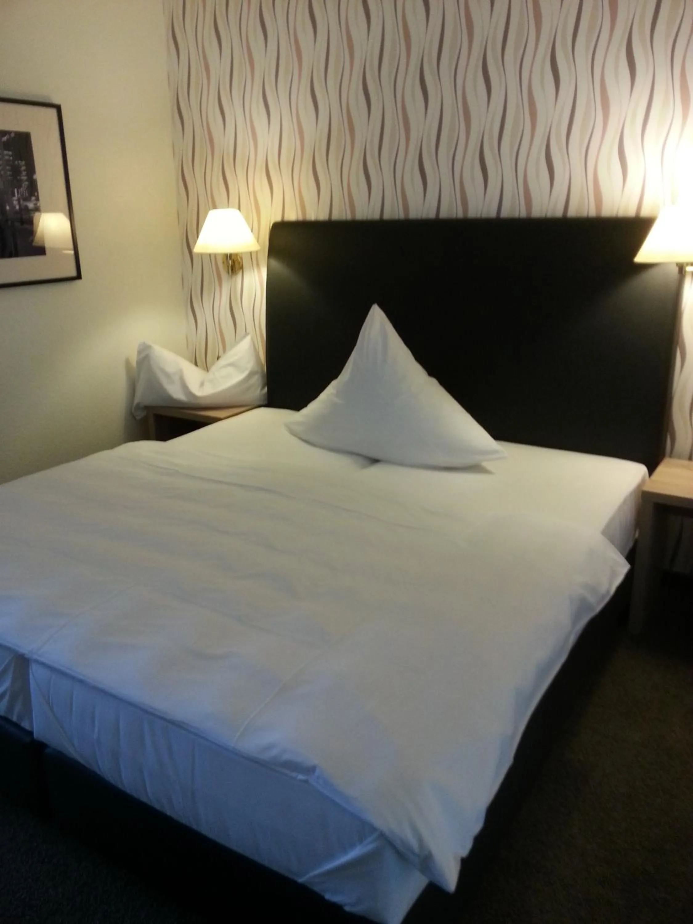 Photo of the whole room, Bed in Hotel Quellenhof