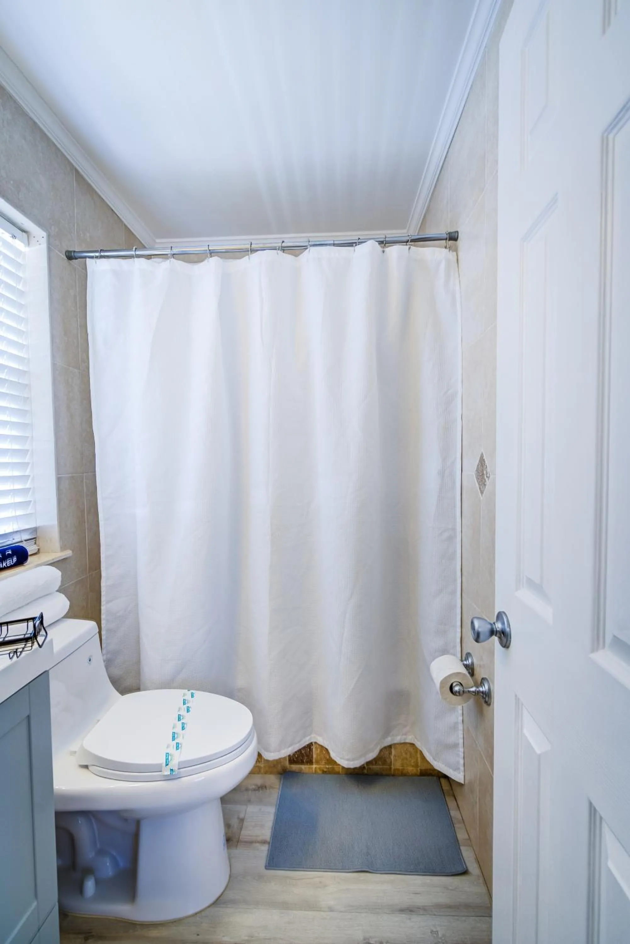 Bathroom in Little Paris by the ocean self check in