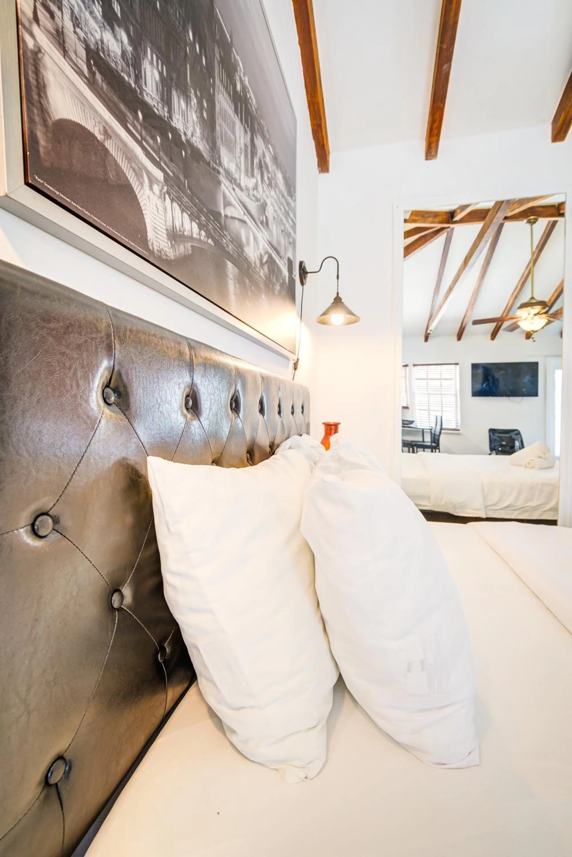 Bed in Little Paris by the ocean self check in