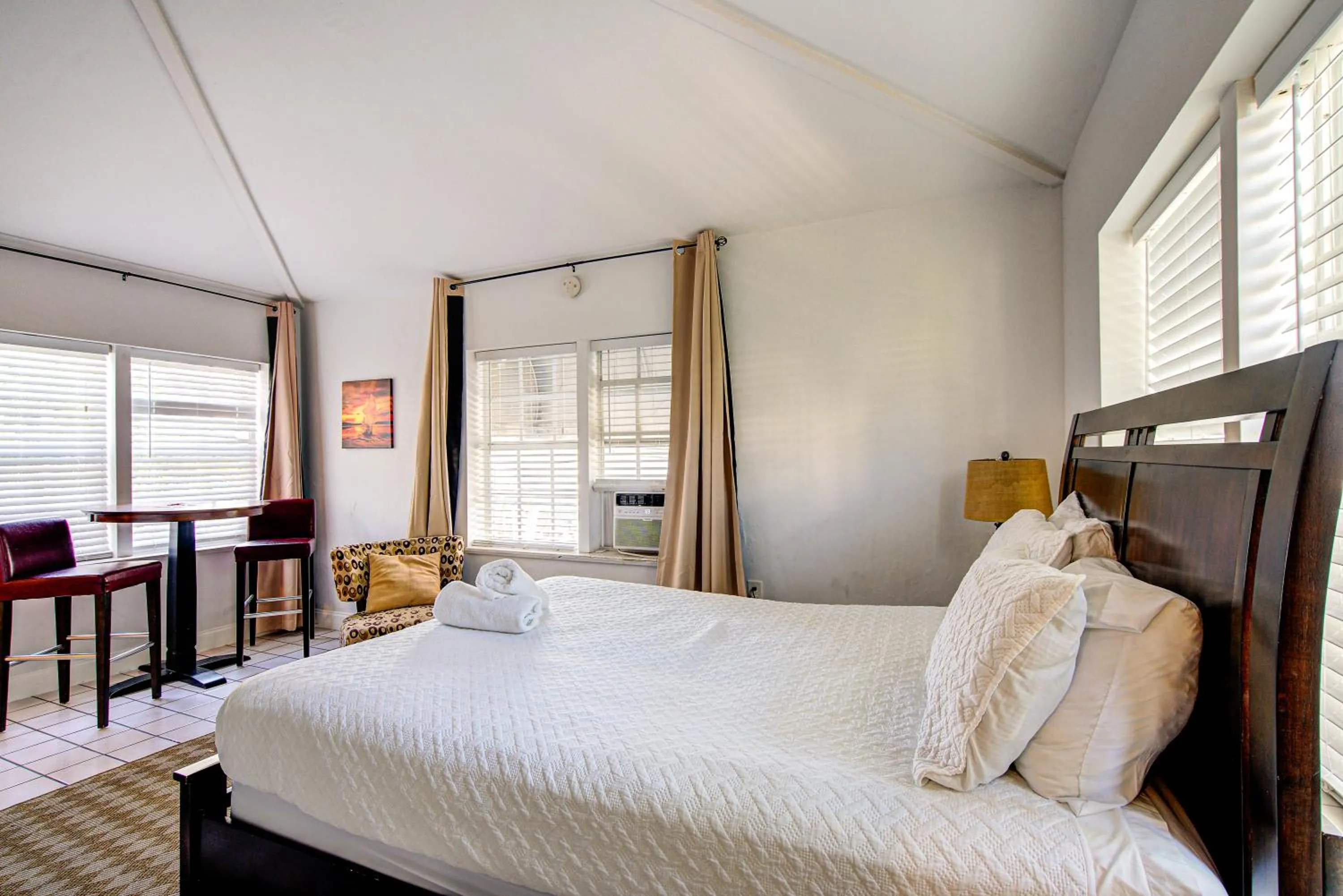 Bed in Little Paris by the ocean self check in