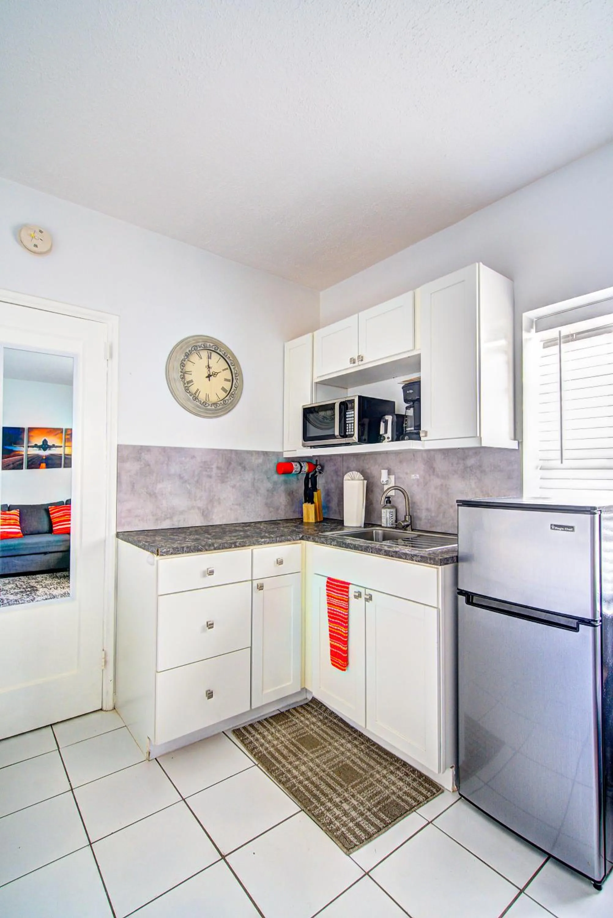 Kitchen or kitchenette in Little Paris by the ocean self check in