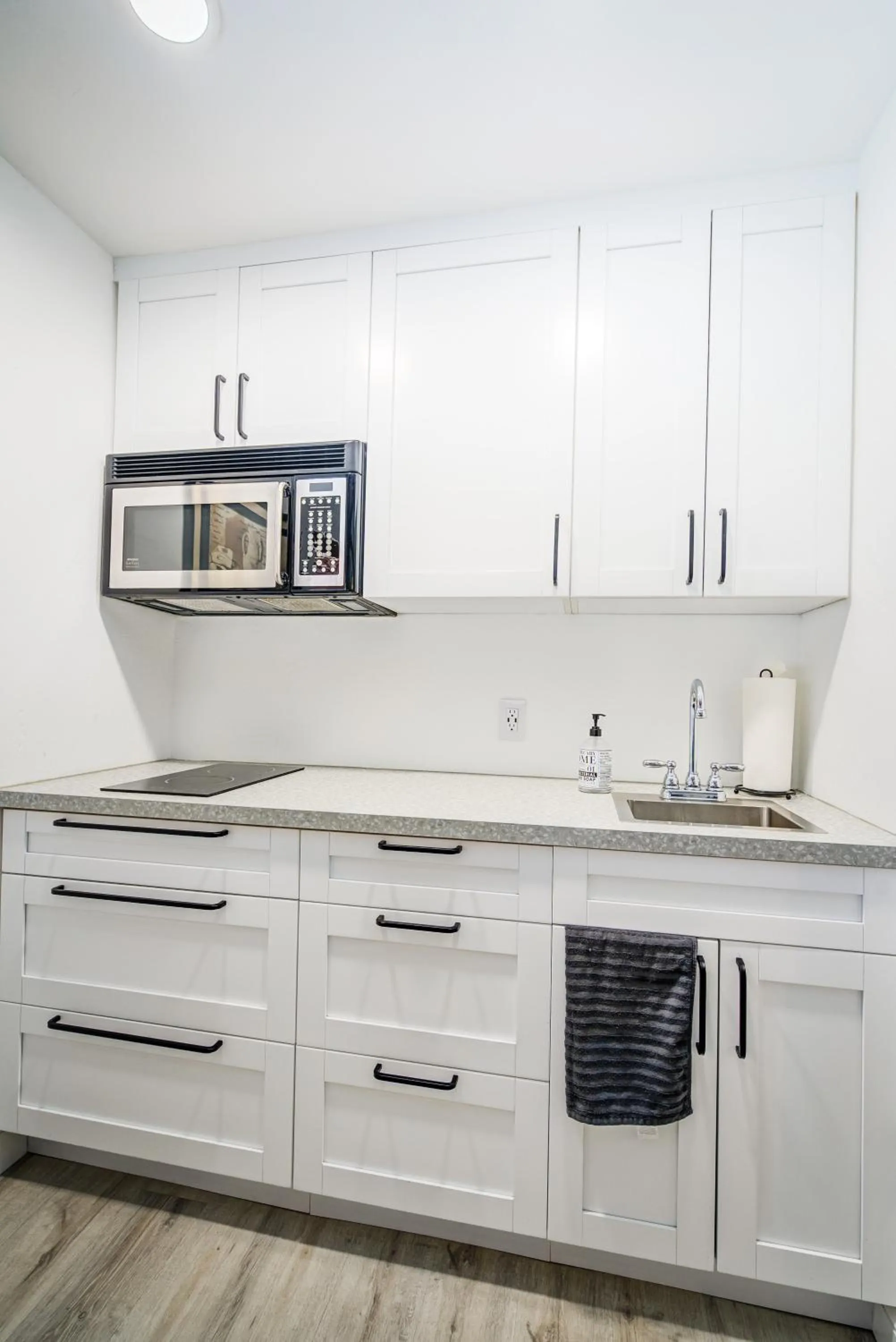 Kitchen or kitchenette in Little Paris by the ocean self check in