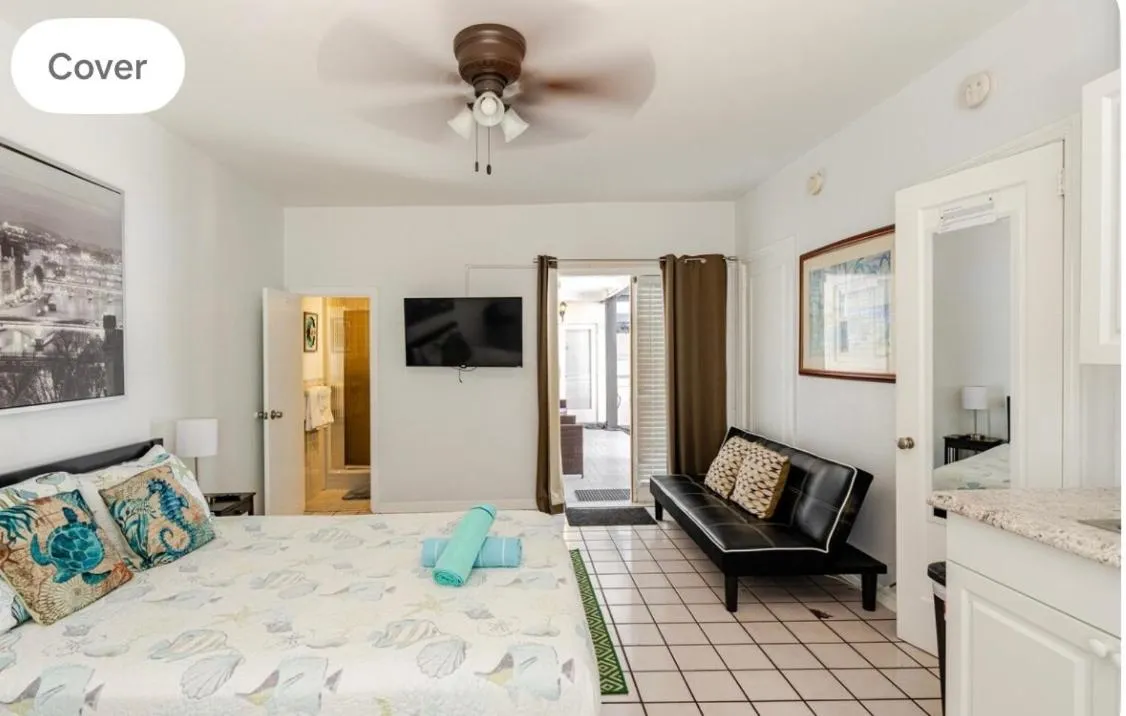 Photo of the whole room, Bed in Little Paris by the ocean self check in