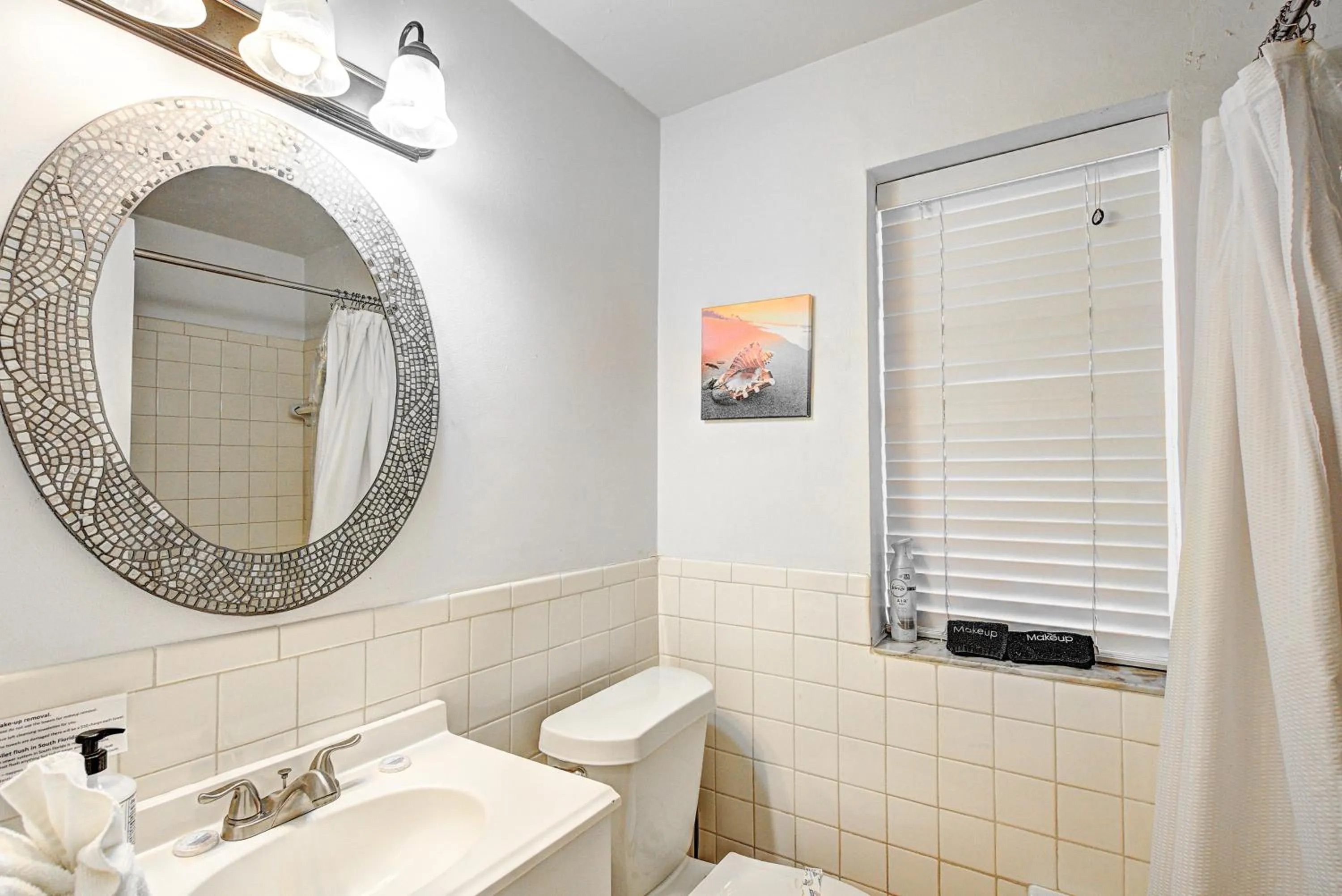 Bathroom in Little Paris by the ocean self check in