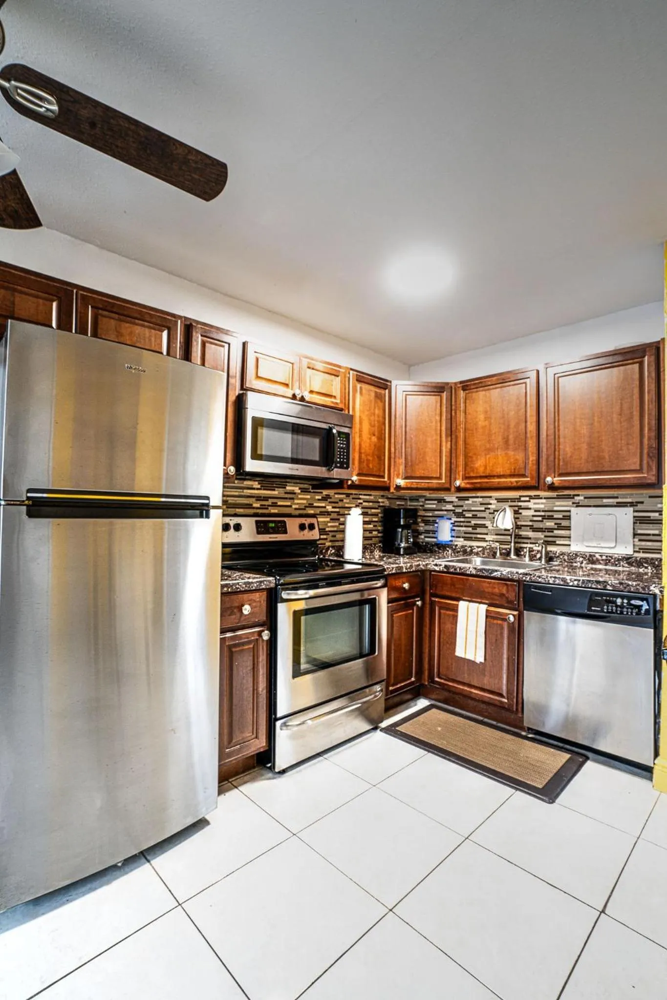 Kitchen or kitchenette in Little Paris by the ocean self check in