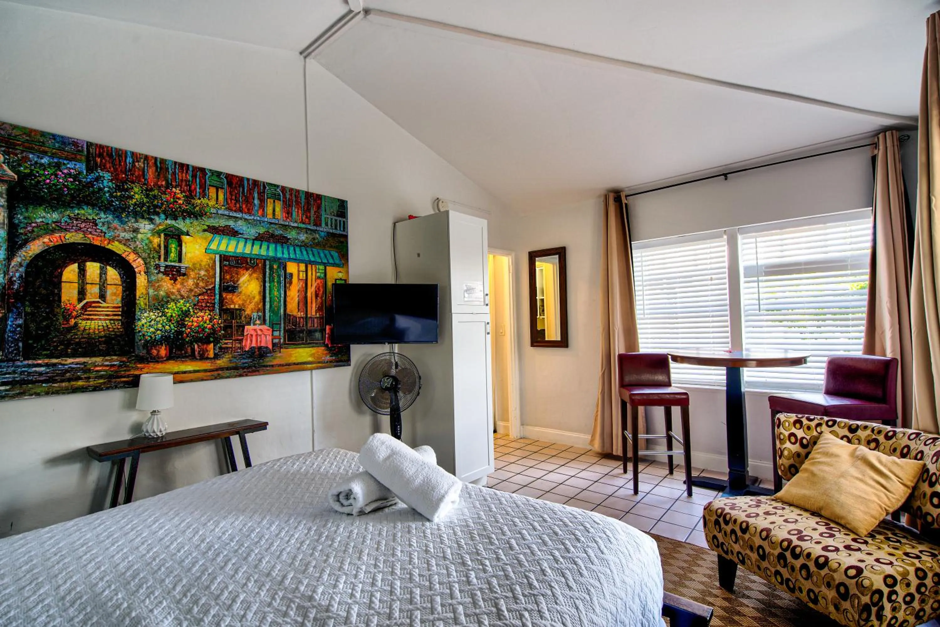 Photo of the whole room, Bed in Little Paris by the ocean self check in