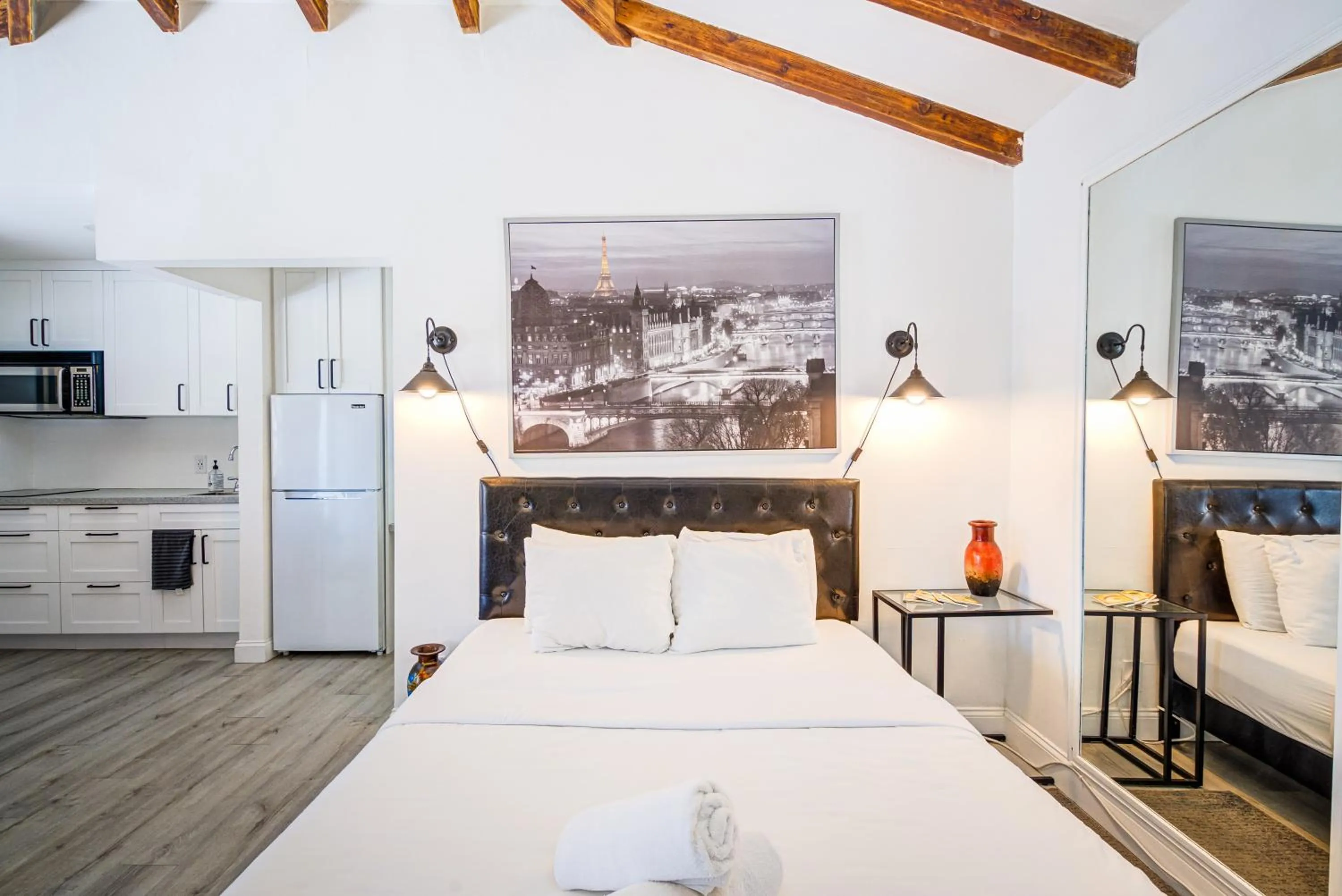 Bed in Little Paris by the ocean self check in