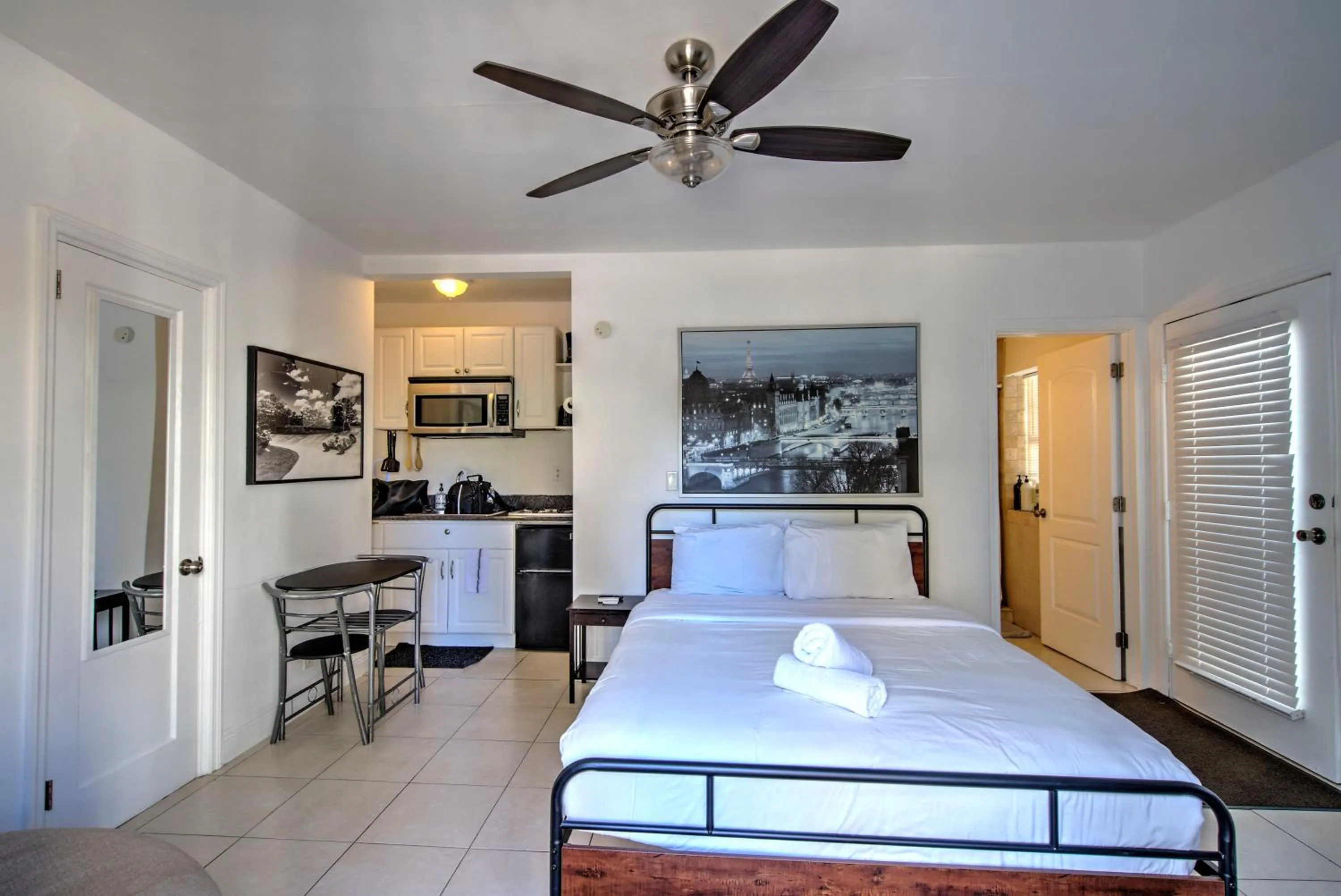 Photo of the whole room, Bed in Little Paris by the ocean self check in