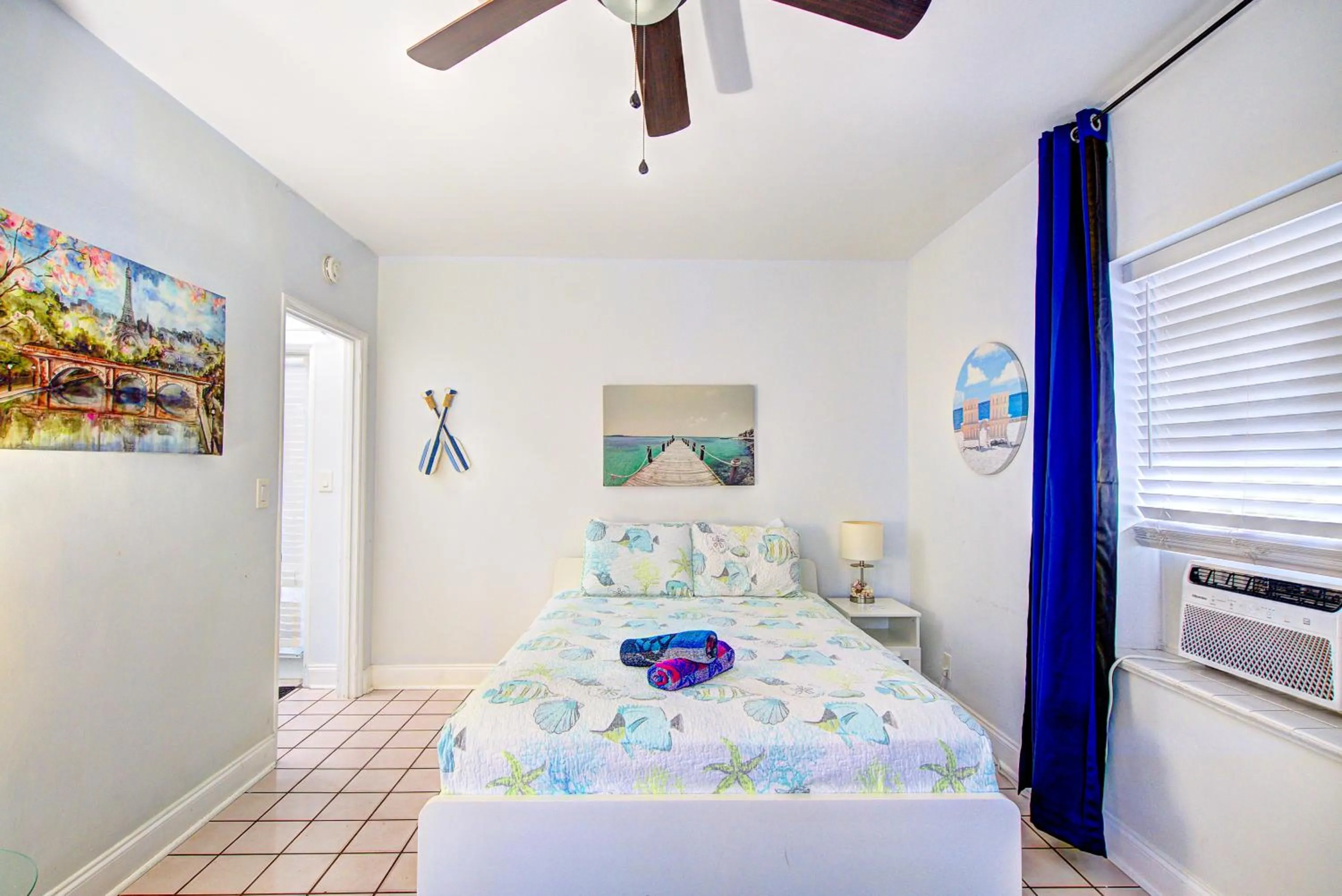 Bed in Little Paris by the ocean self check in