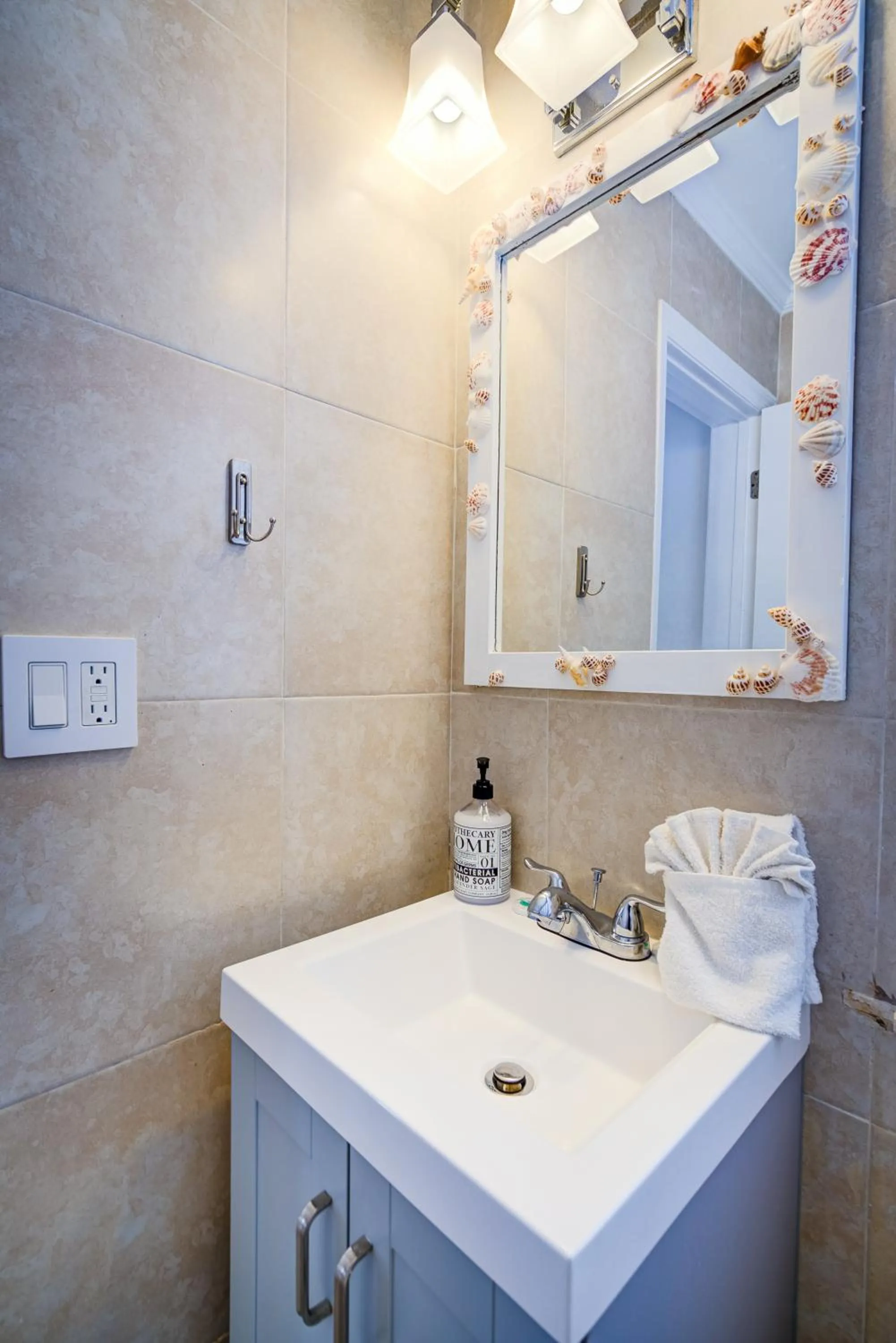 Bathroom in Little Paris by the ocean self check in