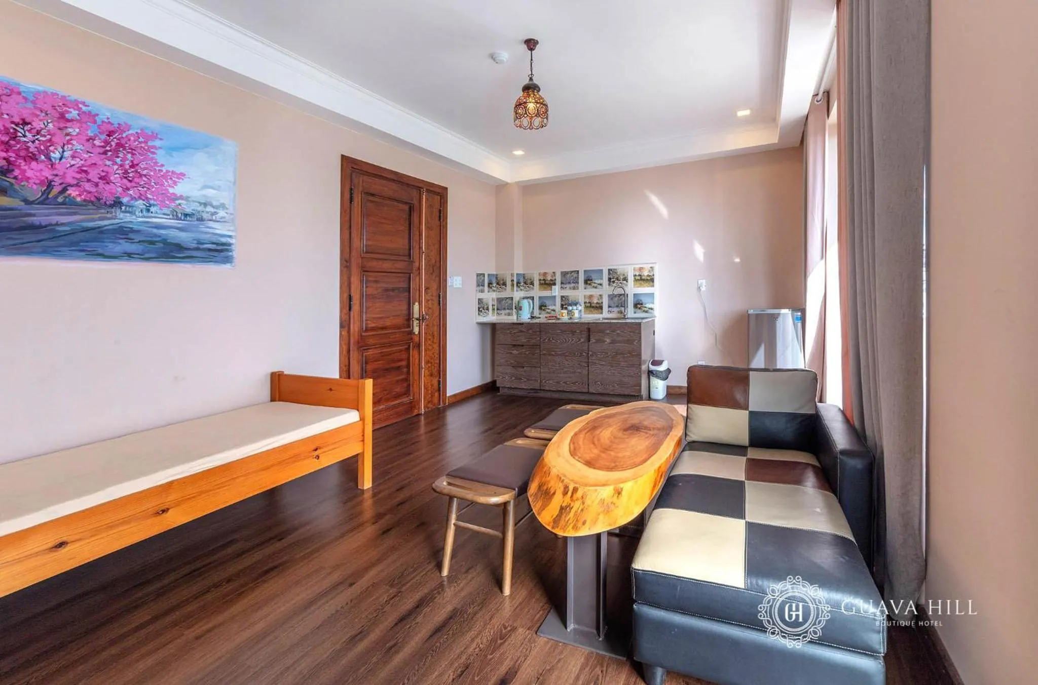 Seating area, Bed in Guava Hill Boutique Hotel