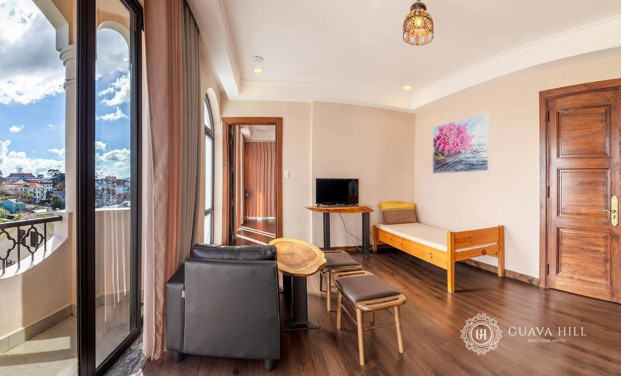 Communal lounge/ TV room in Guava Hill Boutique Hotel