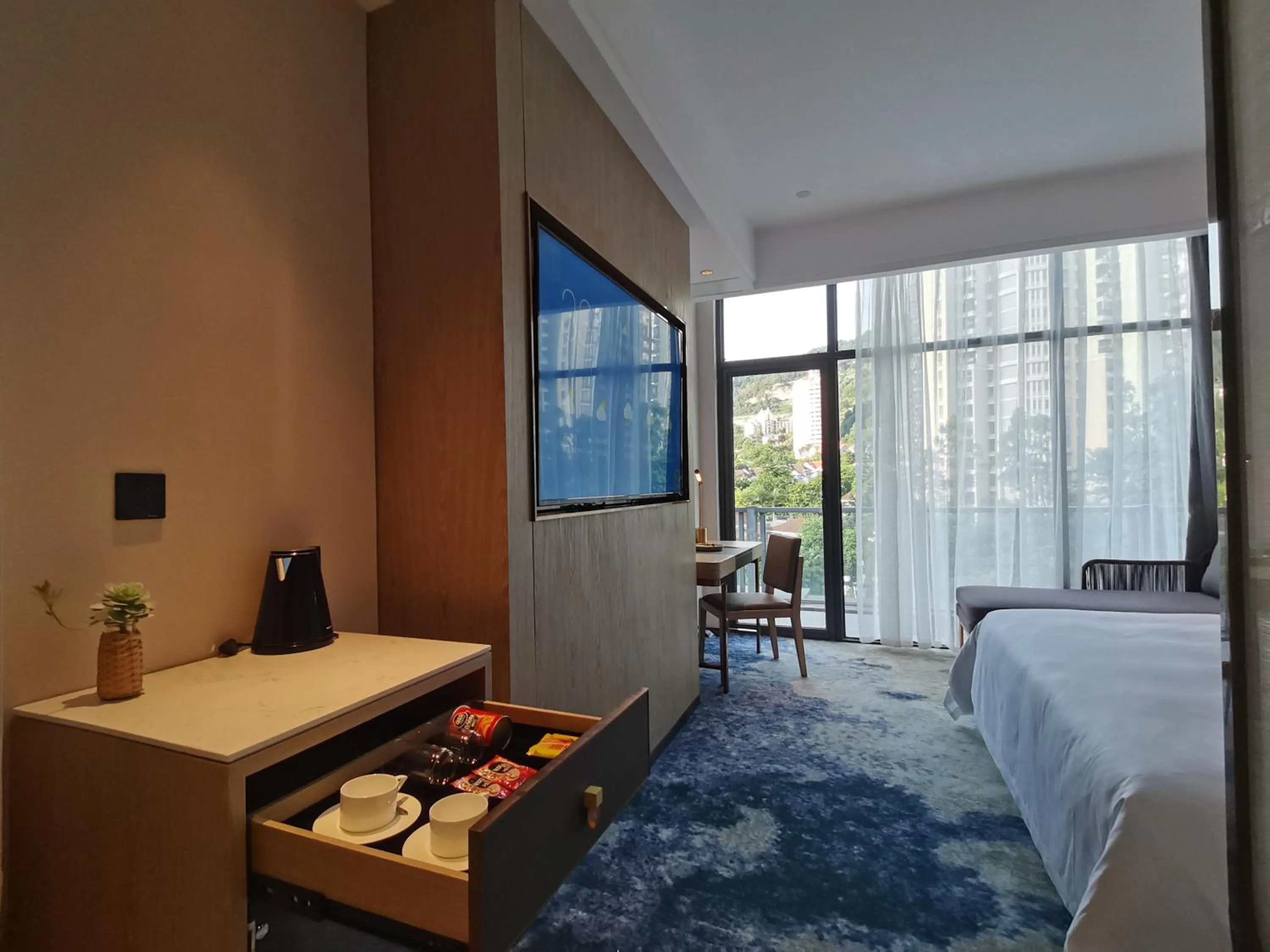 Photo of the whole room, Bed in Paco Hotel Jinfeng Metro Guangzhou