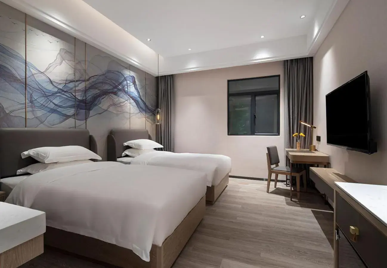 Standard Twin Room in Paco Hotel Jinfeng Metro Guangzhou Standard Twin Room in Paco Hotel Jinfeng Metro Guangzhou