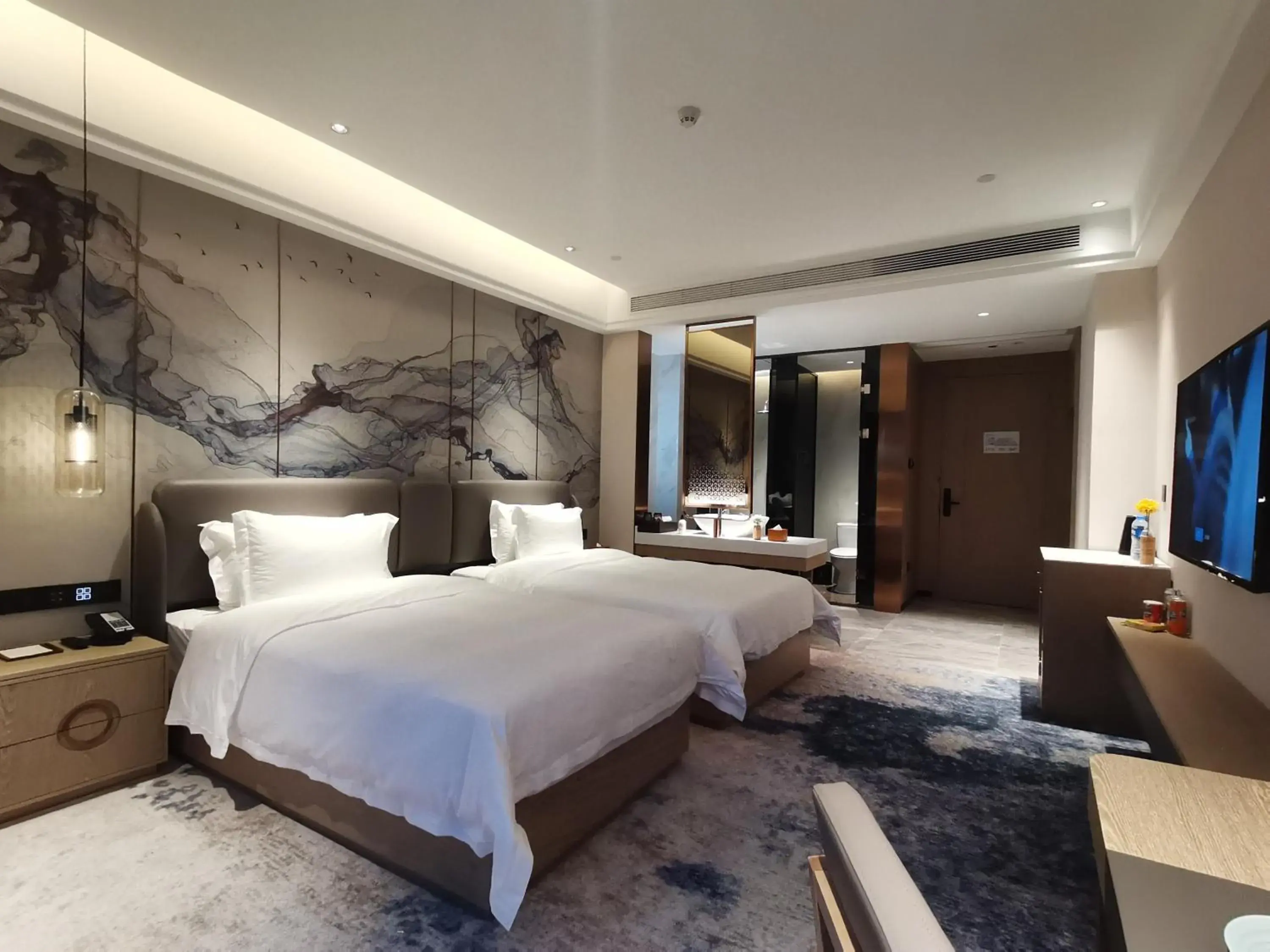 Photo of the whole room, Bed in Paco Hotel Jinfeng Metro Guangzhou Photo of the whole room, Bed in Paco Hotel Jinfeng Metro Guangzhou