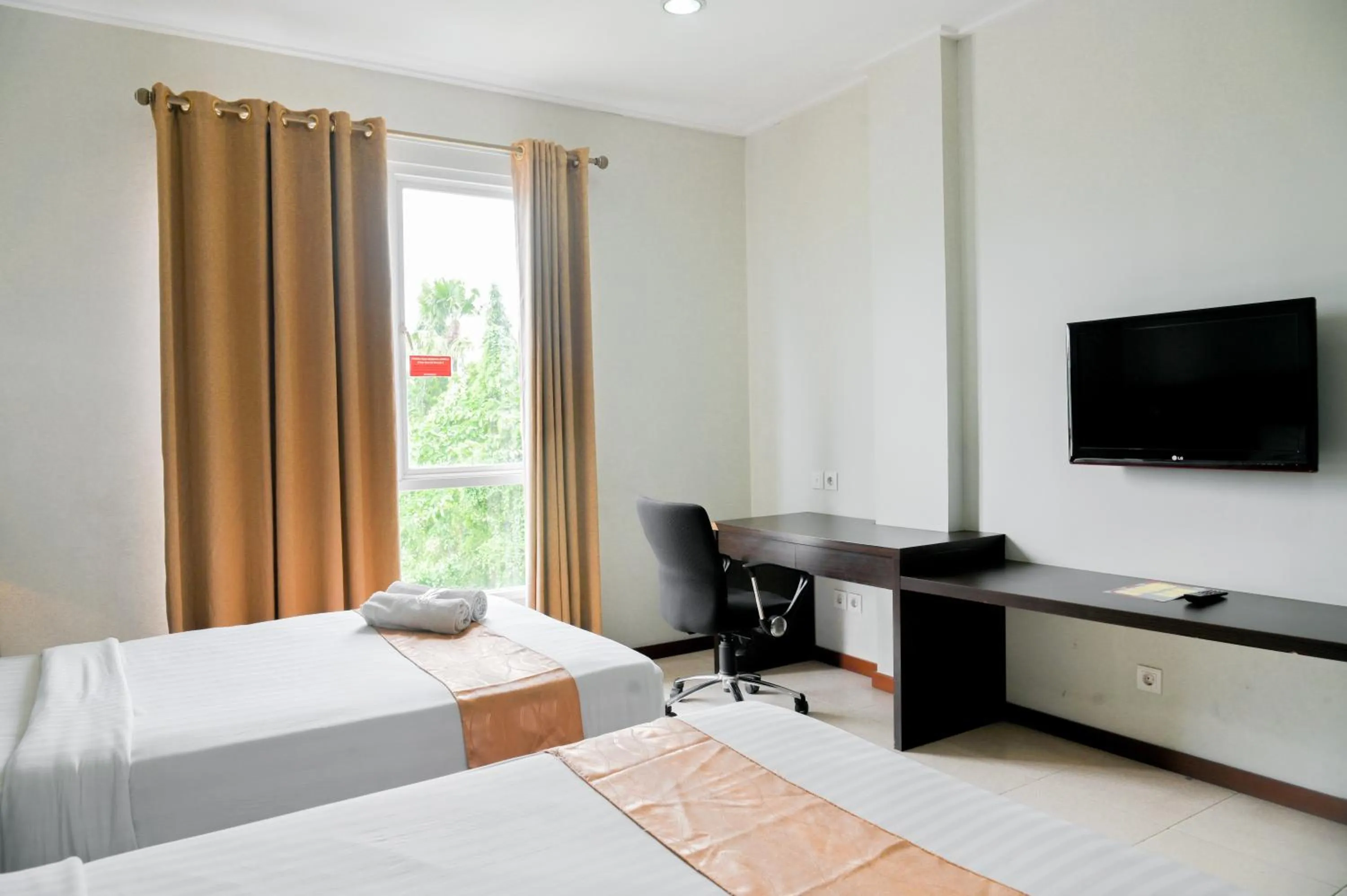 Bed in Hotel Bonero Residence