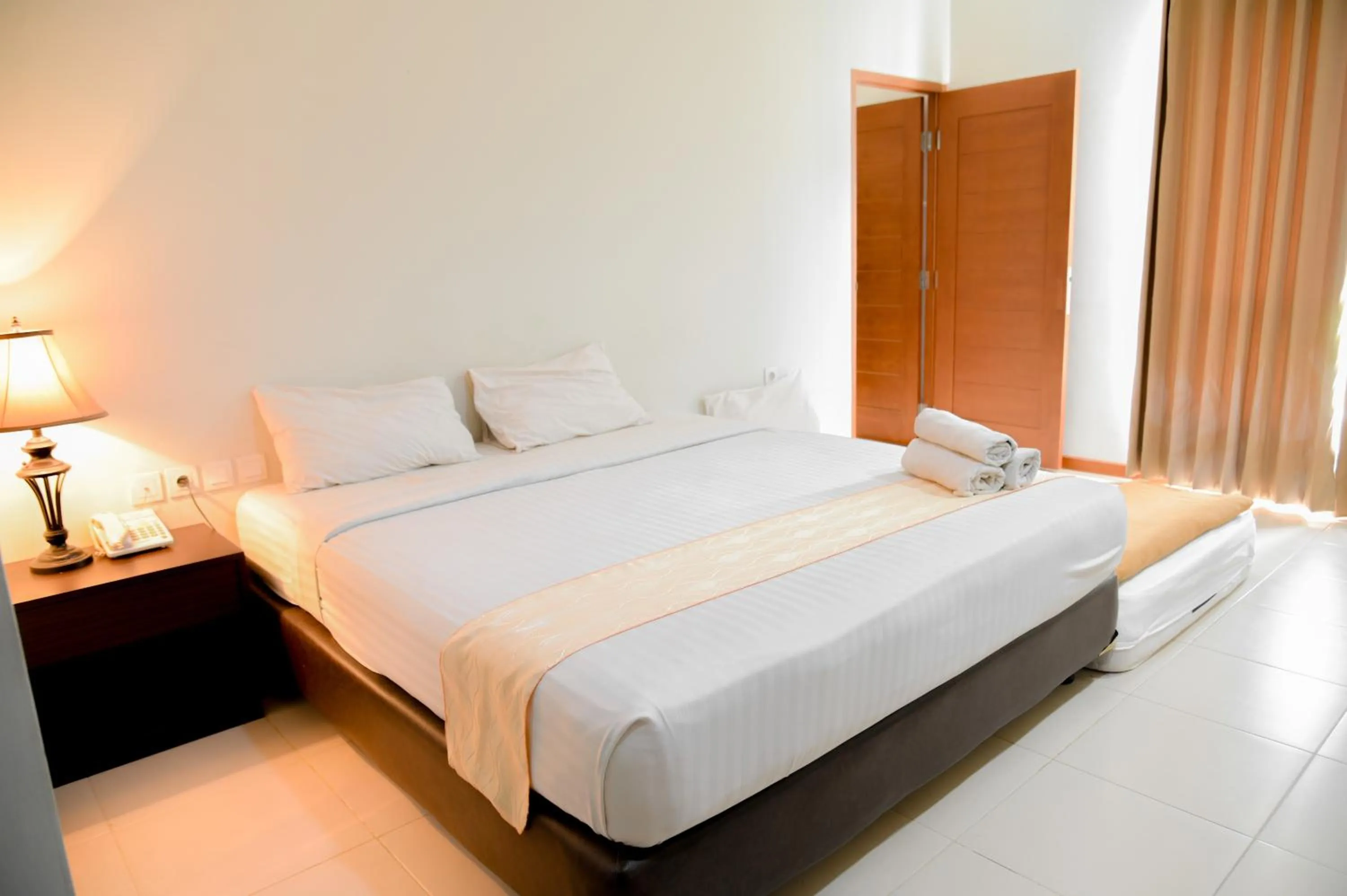 Bed in Hotel Bonero Residence